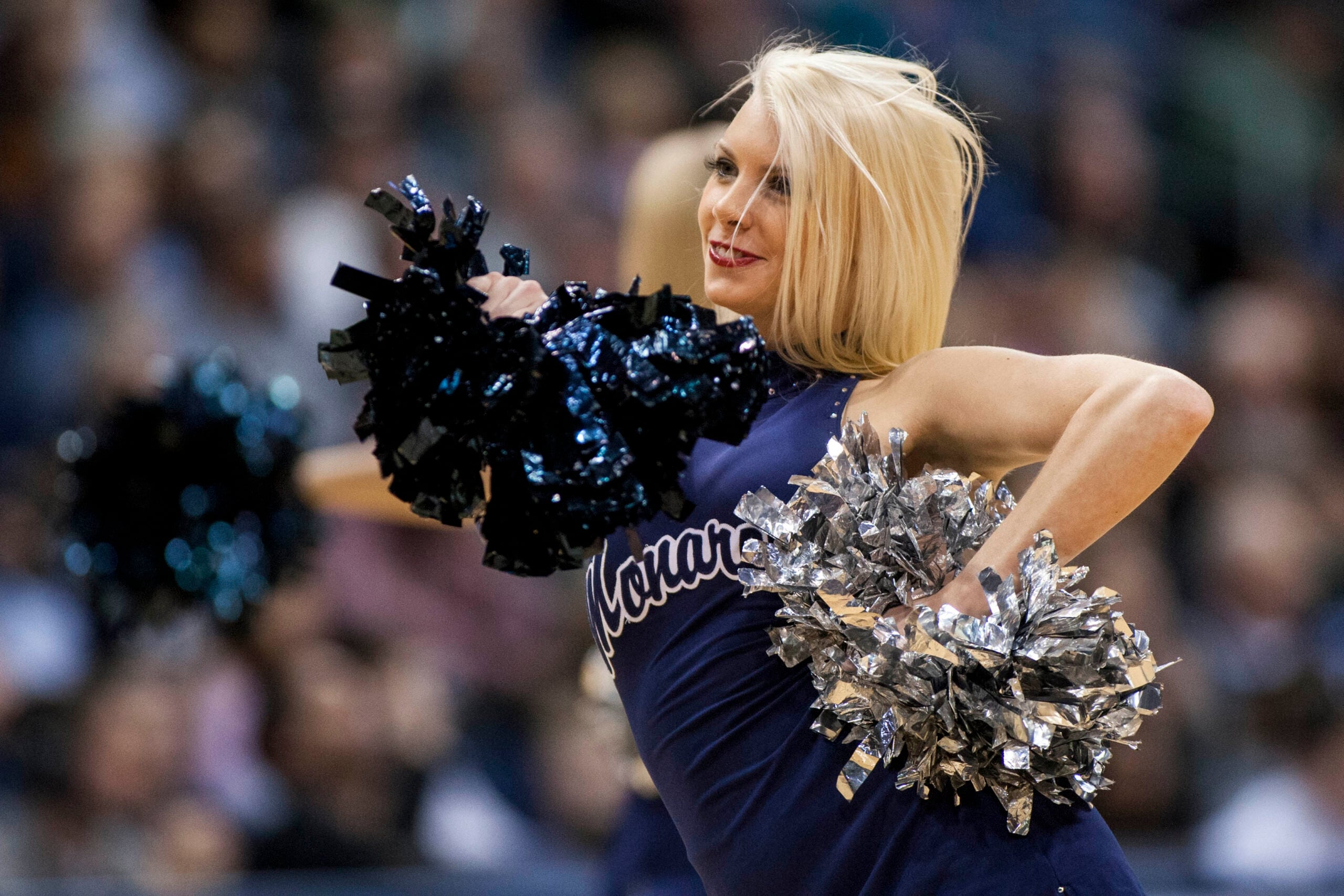 Jan 15, 2015; Norfolk, VA, USA; An Old Dominion Monarchs cheerleader performs during a time out against the Rice Owls at Constant Convocation Center. Mandatory Credit: Peter Casey-Imagn Images