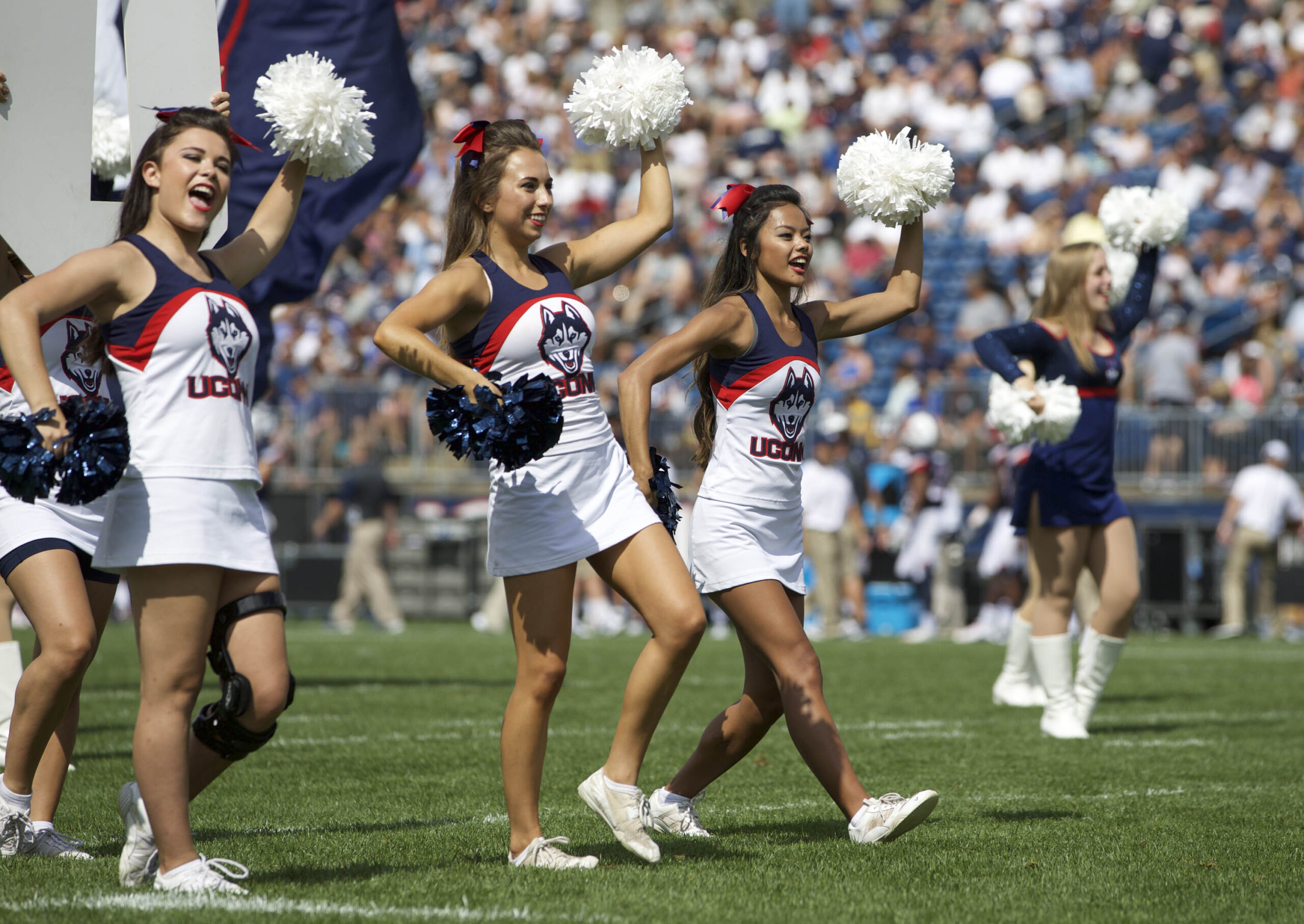 Sep 12, 2015; East Hartford, CT, USA; Connecticut Huskies cheerleaders perform during a break in the action against he Army Black Knights in the first half at Rentschler Field. Mandatory Credit: David Butler II-Imagn Images