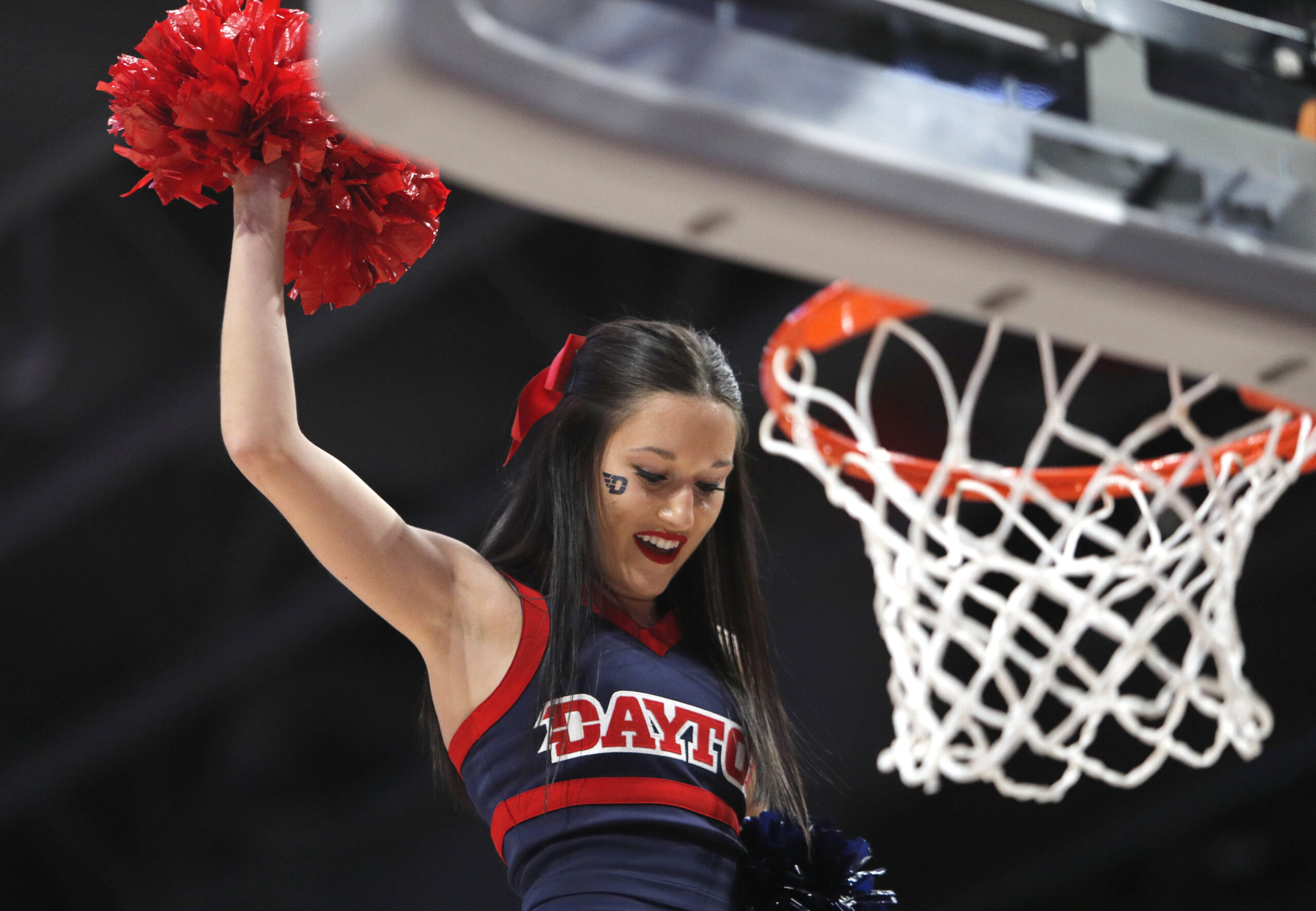 Feb 1, 2020; Dayton, Ohio, USA; A Dayton Flyers cheerleader performs during the second half against the Fordham Rams at University of Dayton Arena. Mandatory Credit: David Kohl-Imagn Images
