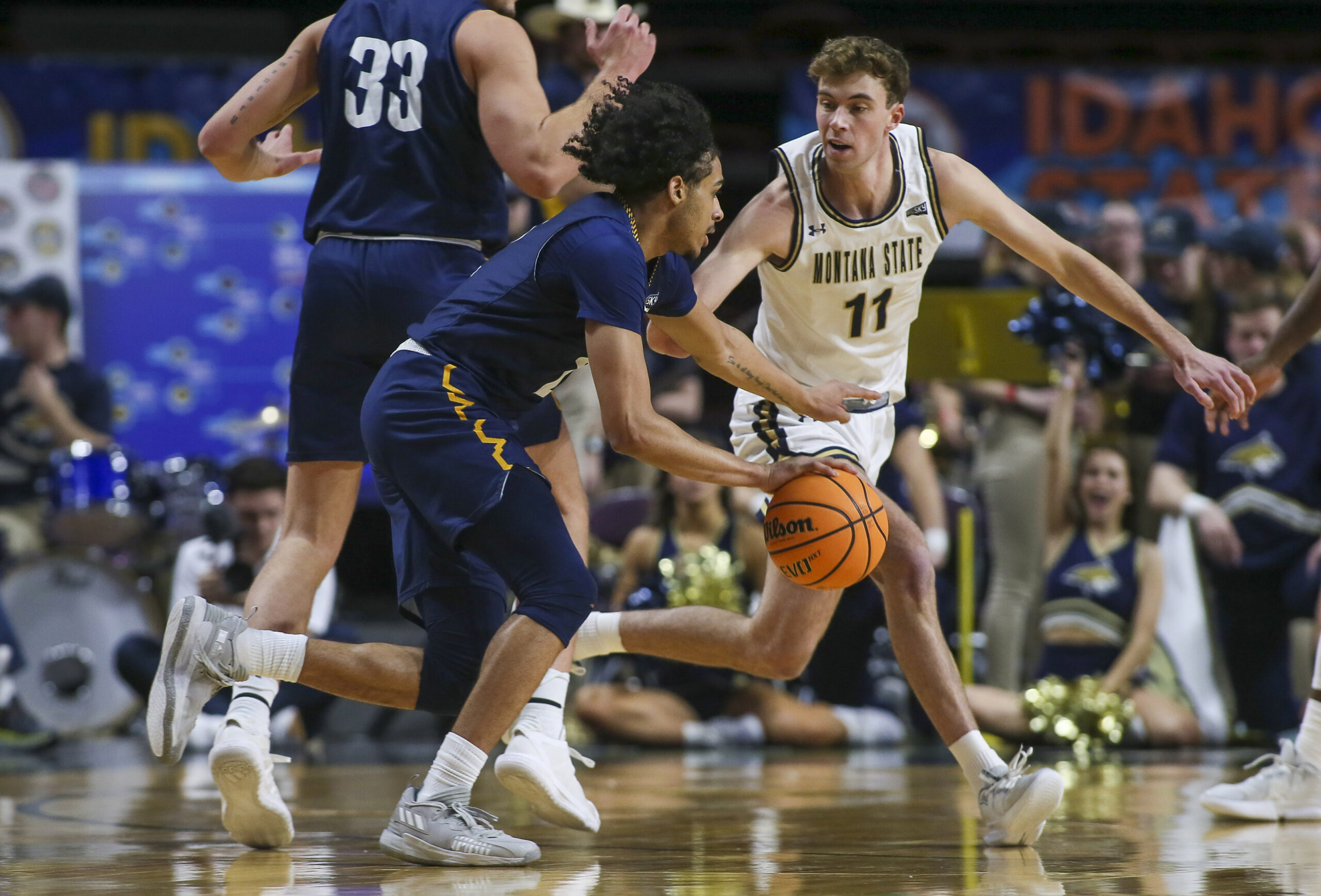 Mar 8, 2023; Boise, ID, USA; Montana State Bobcats guard Tyler Patterson (11) defends Northern Arizona Lumberjacks guard Xavier Fuller (2) during the first half at Idaho Central Arena. Mandatory Credit: Brian Losness-Imagn Images