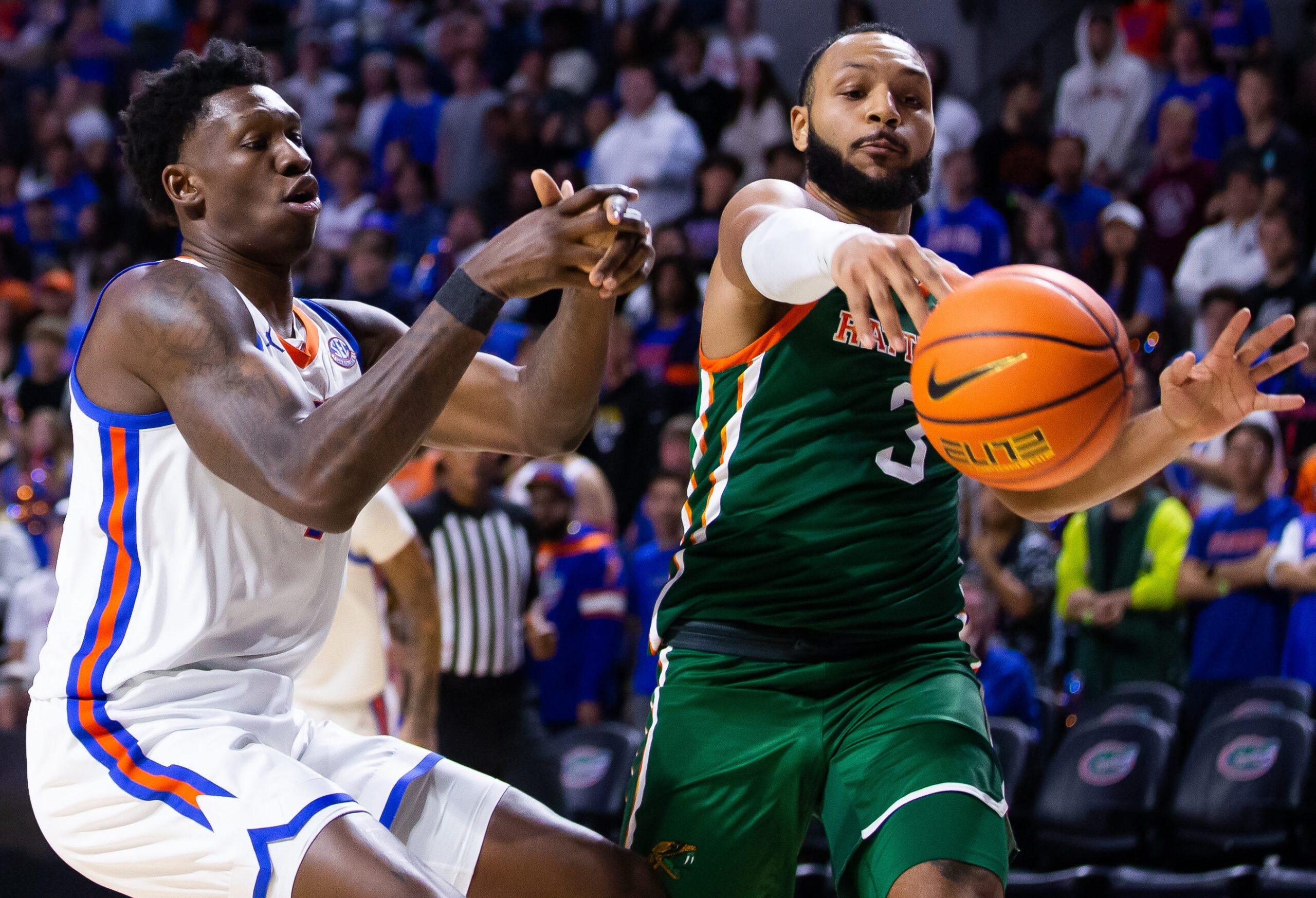 Florida Gators forward Tyrese Samuel (4) has the ball stolen by Florida A&M Rattlers guard Morrell Schramm (3). The Florida men   s basketball team hosted Florida A&M at Exactech Arena at the Stephen C. O   Connell Center in Gainesville, FL on Tuesday, November 14, 2023 in the second half. [Doug Engle/Ocala Star Banner]