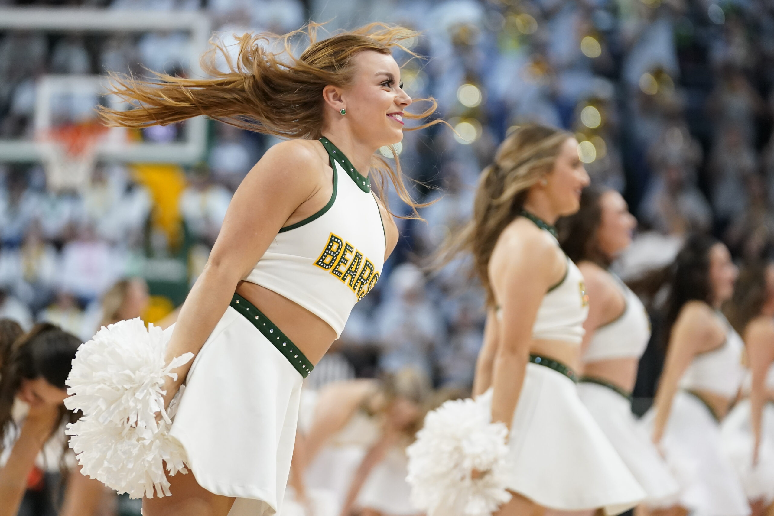 Mar 2, 2024; Waco, Texas, USA; Baylor cheerleaders preform during a time out in the first half of game between the Baylor Bears and the Kansas Jayhawks at Paul and Alejandra Foster Pavilion. Mandatory Credit: Raymond Carlin III-Imagn Images