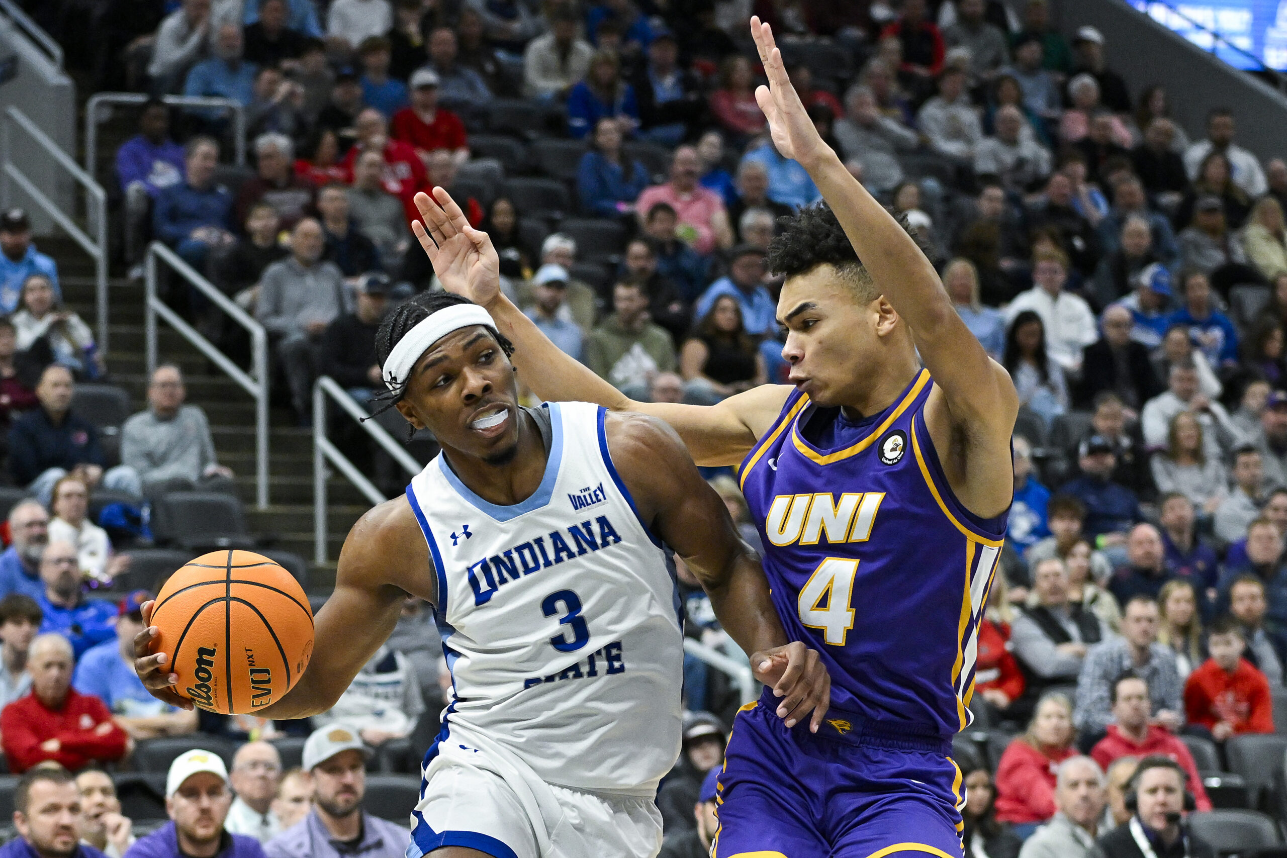 Mar 9, 2024; St. Louis, MO, USA;  Indiana State Sycamores guard Ryan Conwell (3) drives to the basket as Northern Iowa Panthers guard Trey Campbell (4) defends during the first half of the Missouri Valley Conference Tournament semifinal game at Enterprise Center. Mandatory Credit: Jeff Curry-Imagn Images