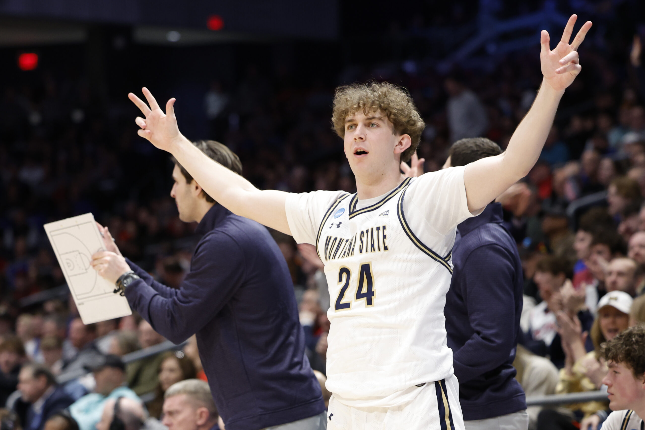 Mar 20, 2024; Dayton, OH, USA; Montana State Bobcats guard Jed Miller (24) celebrates in the second half against the Grambling State Tigers at UD Arena. Mandatory Credit: Rick Osentoski-Imagn Images