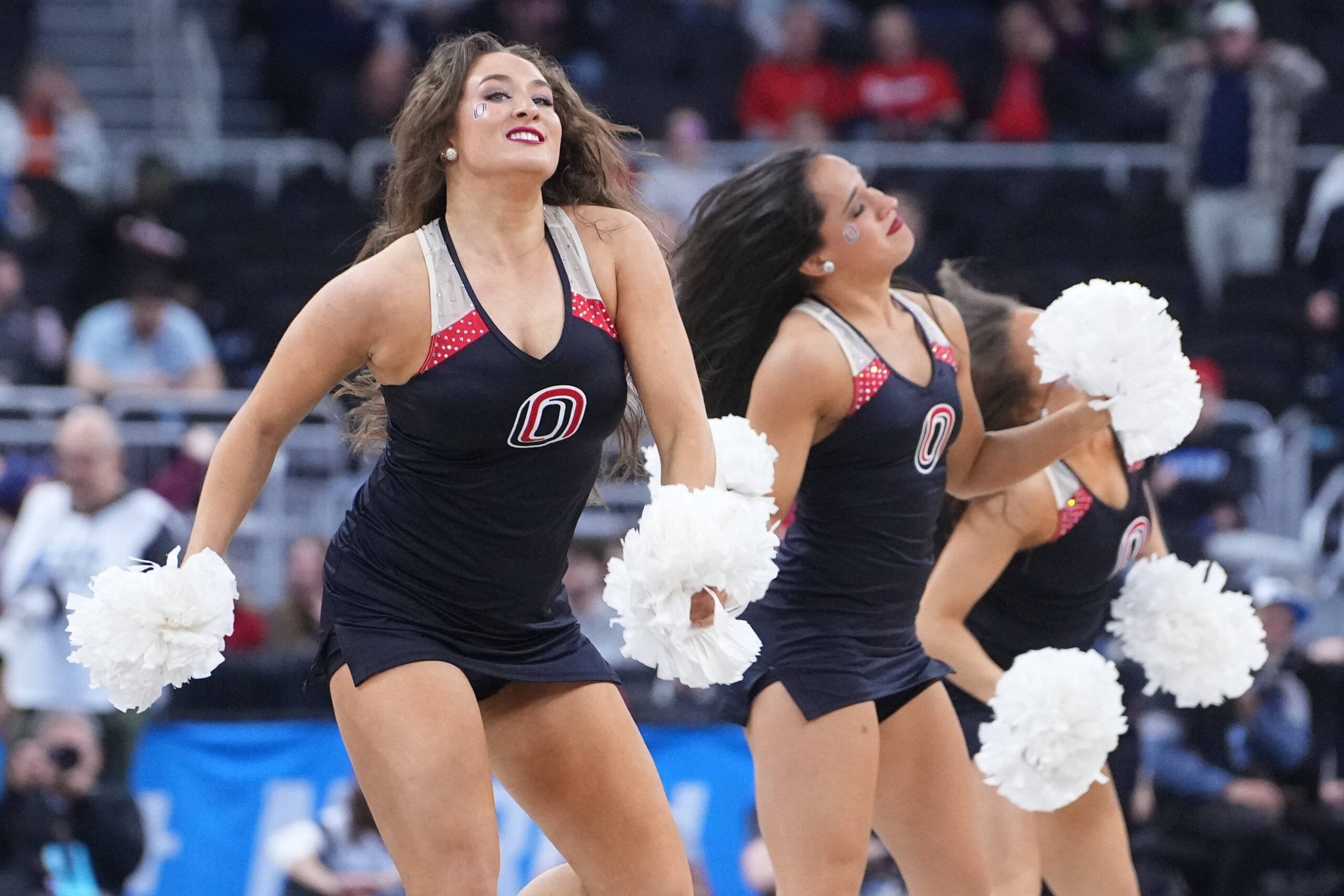 Mar 20, 2025; Providence, RI, USA;  Omaha Mavericks cheerleaders on the court between play during the second half against the St. John's Red Storm at Amica Mutual Pavilion. Mandatory Credit: Gregory Fisher-Imagn Images