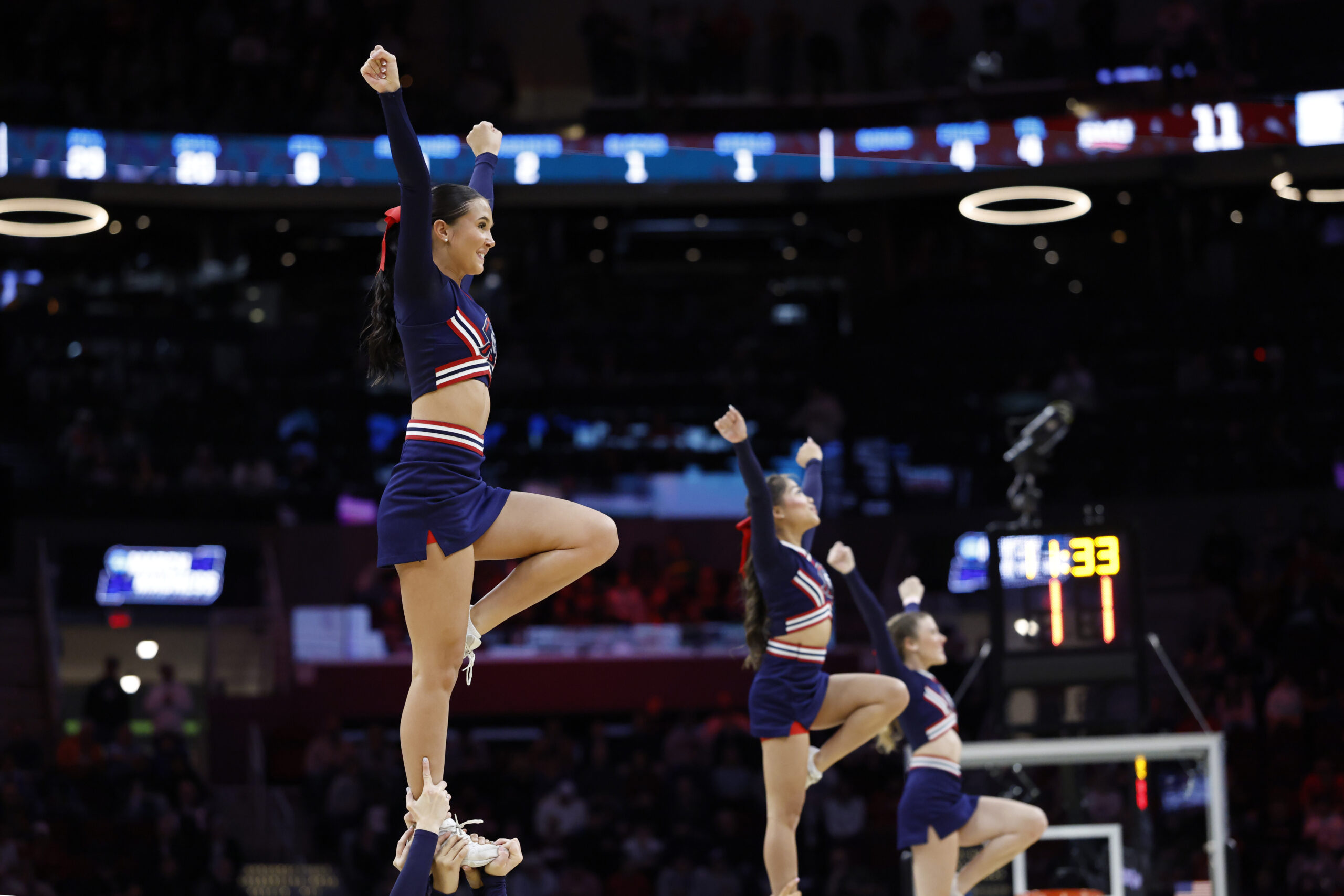 Mar 21, 2025; Cleveland, OH, USA; Robert Morris Colonials cheerleaders perform in the first half against the Alabama Crimson Tide during the NCAA Tournament First Round at Rocket Arena. Mandatory Credit: Rick Osentoski-Imagn Images