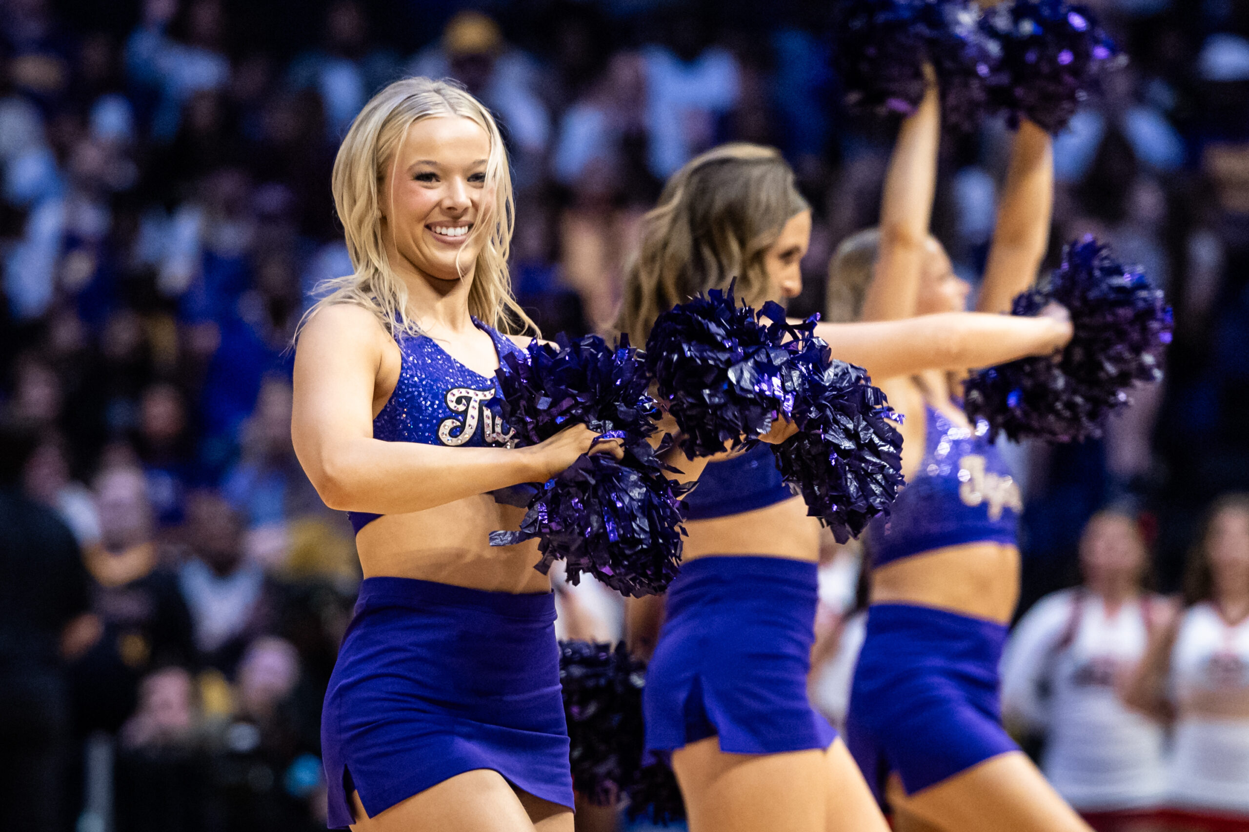 Mar 22, 2025; Baton Rouge, Louisiana, USA; LSU Lady Tigers cheerleaders on a time out against the San Diego State Aztecs during the first half at Pete Maravich Assembly Center. Mandatory Credit: Stephen Lew-Imagn Images