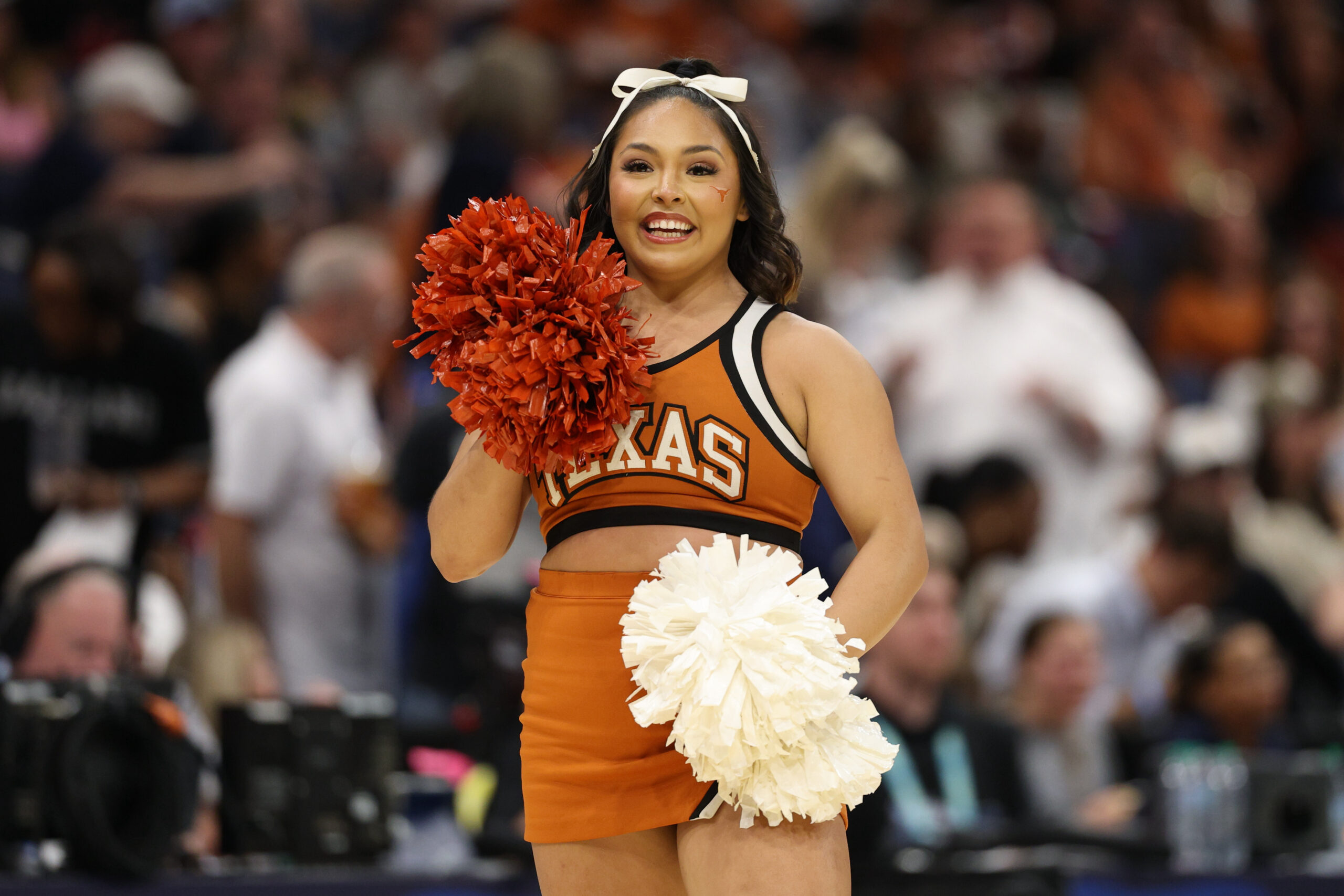 Apr 4, 2025; Tampa, FL, USA; The Texas Longhorns cheerleaders perform during the third quarter in a semifinal of the women's 2025 NCAA tournament against the South Carolina Gamecocks at Amalie Arena. Mandatory Credit: Nathan Ray Seebeck-Imagn Images
