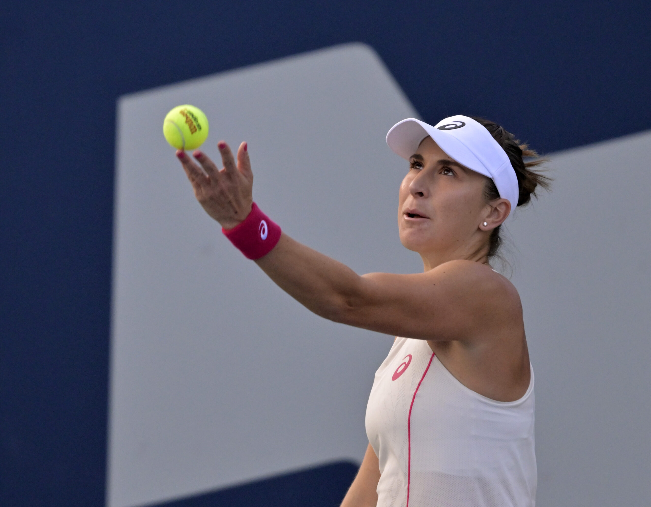 Aug 1, 2025; Montreal, QC, Canada; Belinda Bencic (SUI) serves against Karolina Muchova (CZE) in third round play at IGA Stadium. Mandatory Credit: Eric Bolte-Imagn Images
