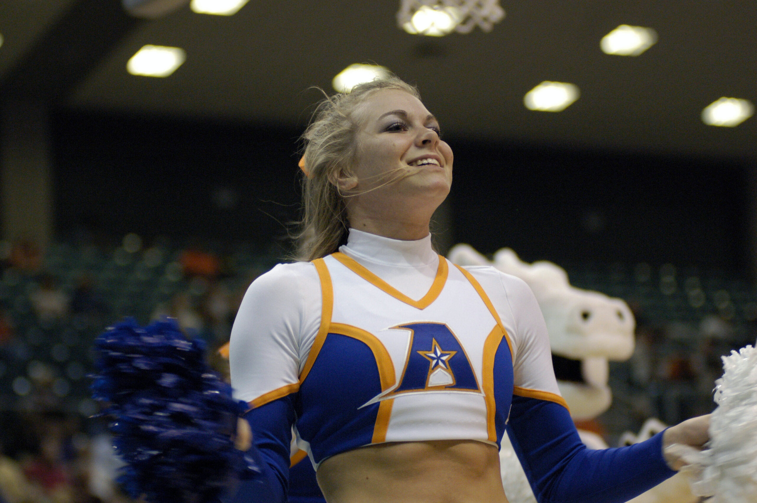 Mar 14, 2008; Katy, TX, USA; UT Arlington Mavericks cheerleader cheers on her team against the Sam Houston Bearkats in the second half of the Southland Conference Tournament at the Merrell Center. Mandatory Credit: Brett Davis-Imagn Images