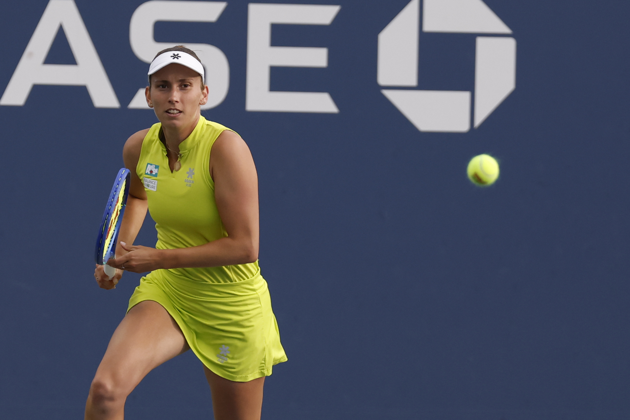Aug 27, 2025; Flushing, NY, USA; Elise Mertens (BEL) chases a shot against Lulu Sun (NZL) (not pictured) on day four of the 2025 US Open tennis tournament at Billie Jean King USTA National Tennis Center. Mandatory Credit: Geoff Burke-Imagn Images