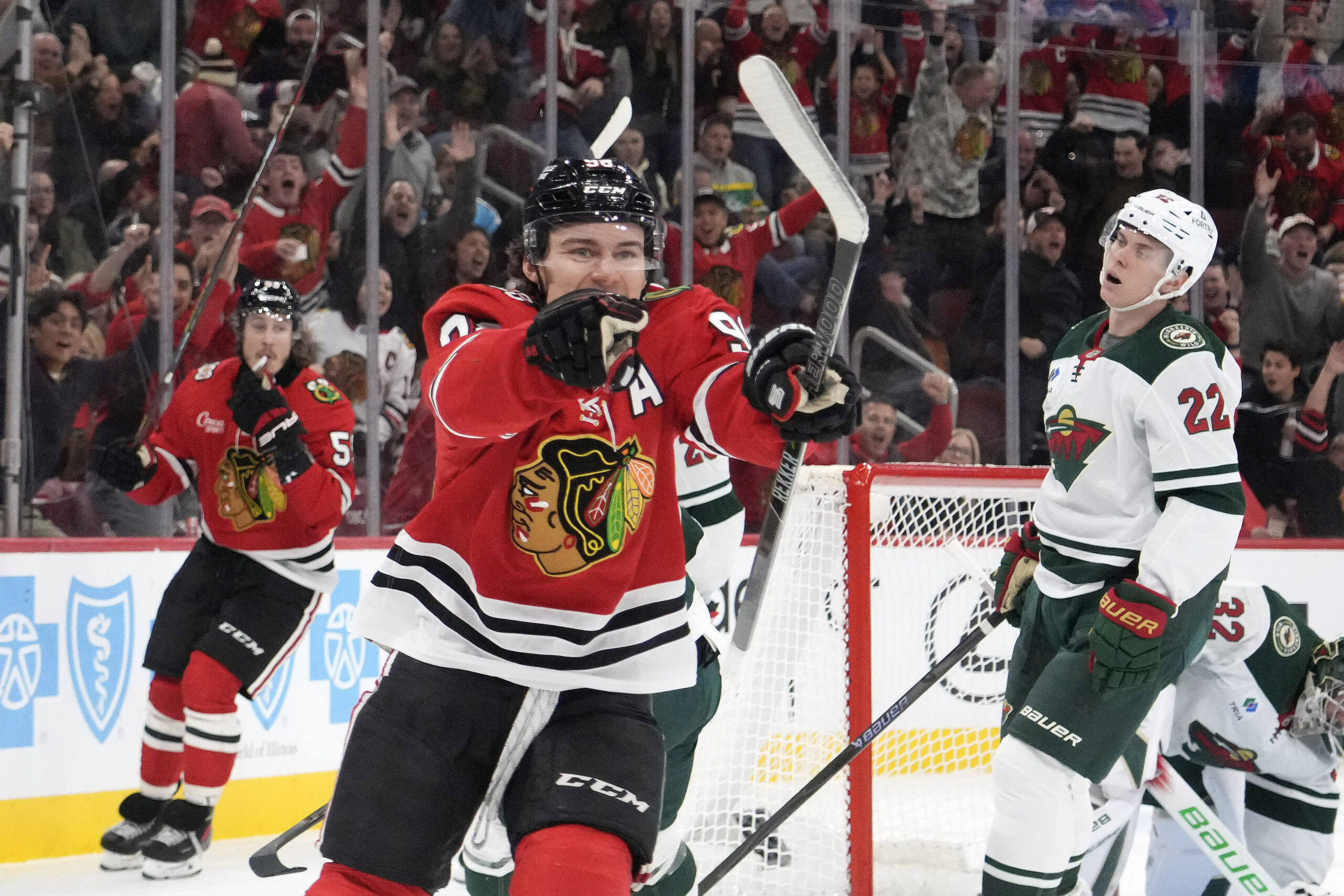 Nov 26, 2025; Chicago, Illinois, USA; Chicago Blackhawks center Connor Bedard (98) celebrates his gaol against the Minnesota Wild during the second period at United Center. Mandatory Credit: David Banks-Imagn Images