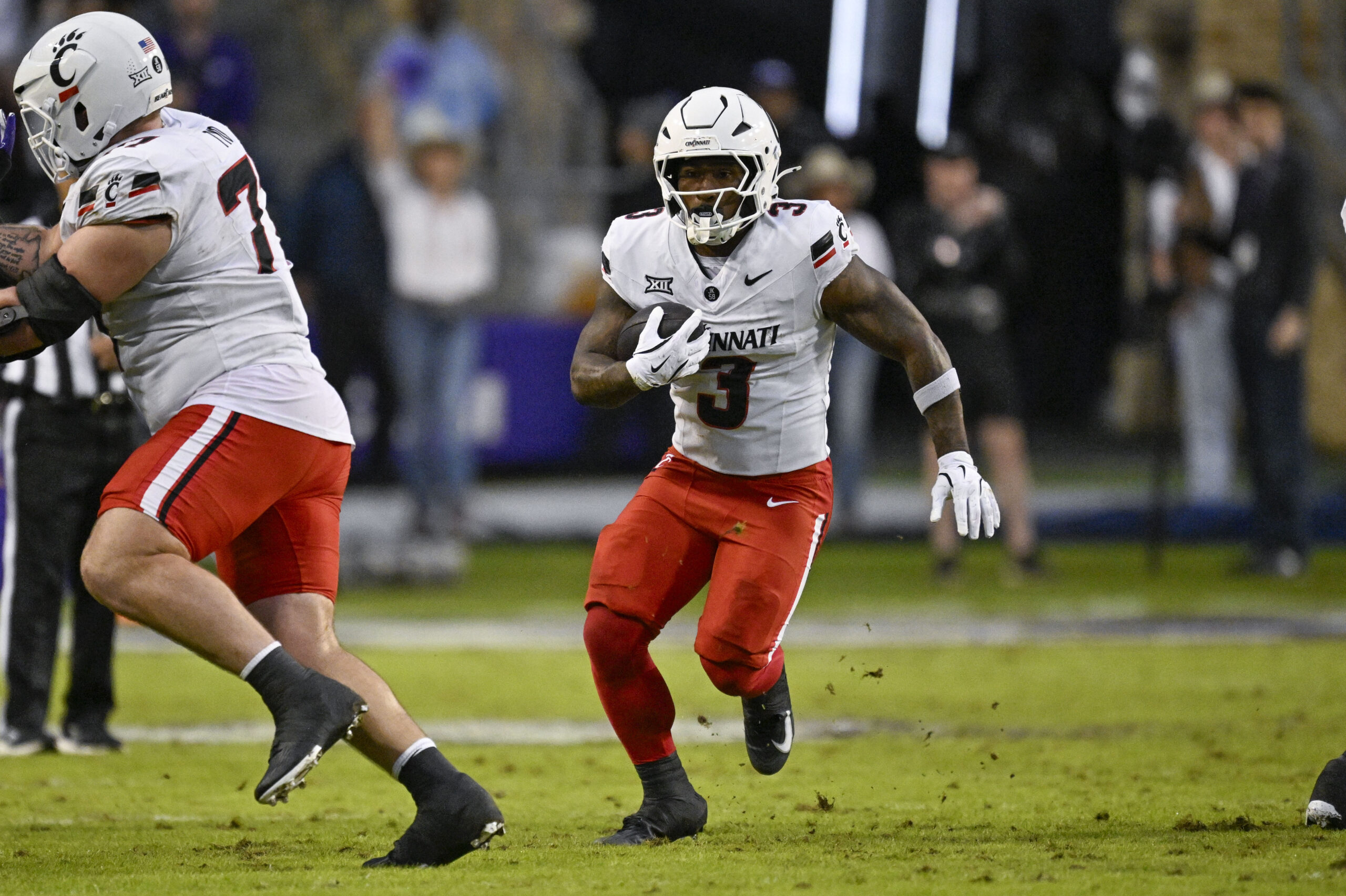 Nov 29, 2025; Fort Worth, Texas, USA; Cincinnati Bearcats running back Tawee Walker (3) runs with the ball during the game between the Horned Frogs and the Bearcats at Amon G. Carter Stadium. Mandatory Credit: Jerome Miron-Imagn Images