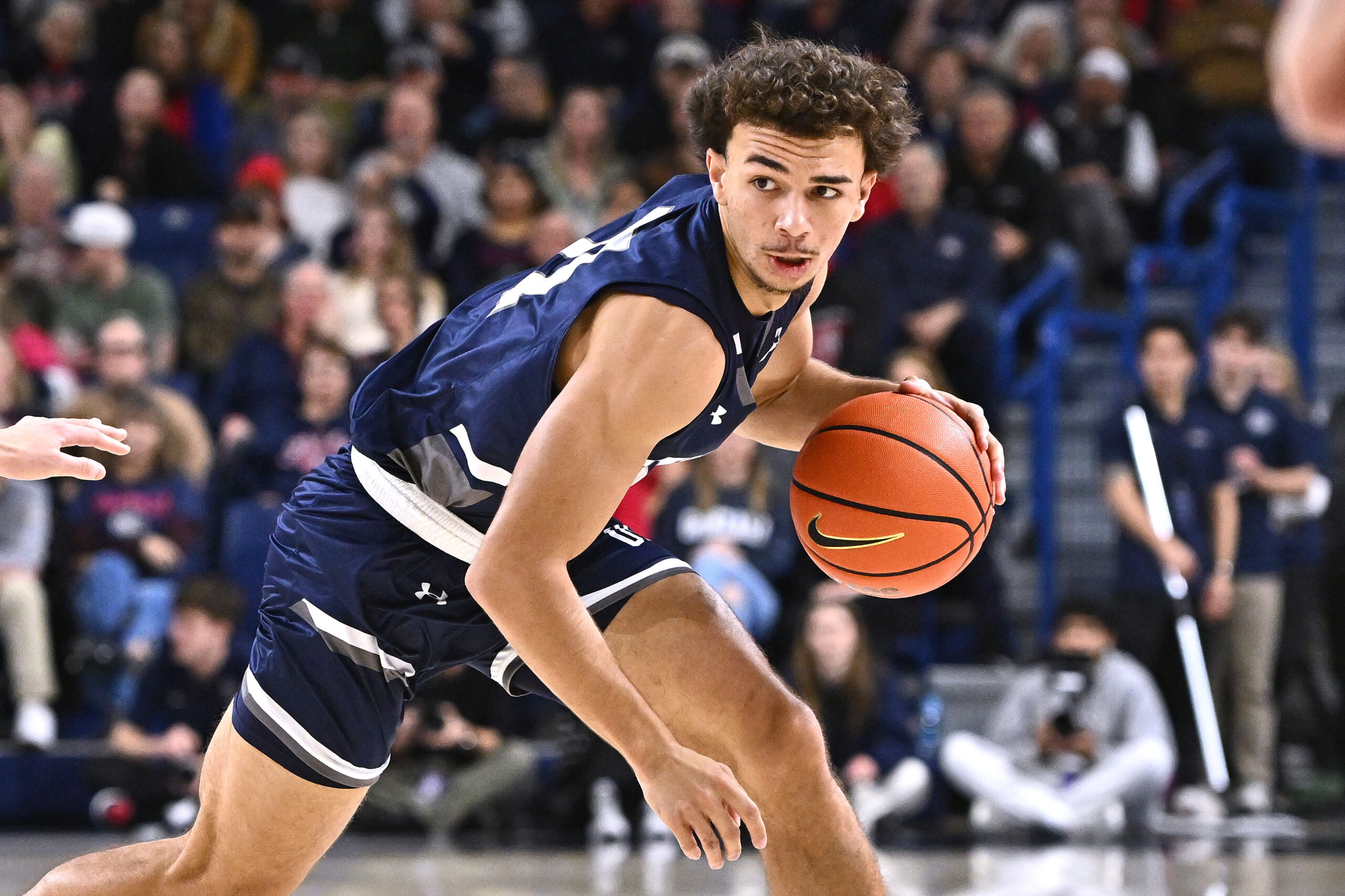 Dec 7, 2025; Spokane, Washington, USA; North Florida Ospreys guard Kamrin Oriol (11) controls the ball against the Gonzaga Bulldogs in the first half at McCarthey Athletic Center. Mandatory Credit: James Snook-Imagn Images