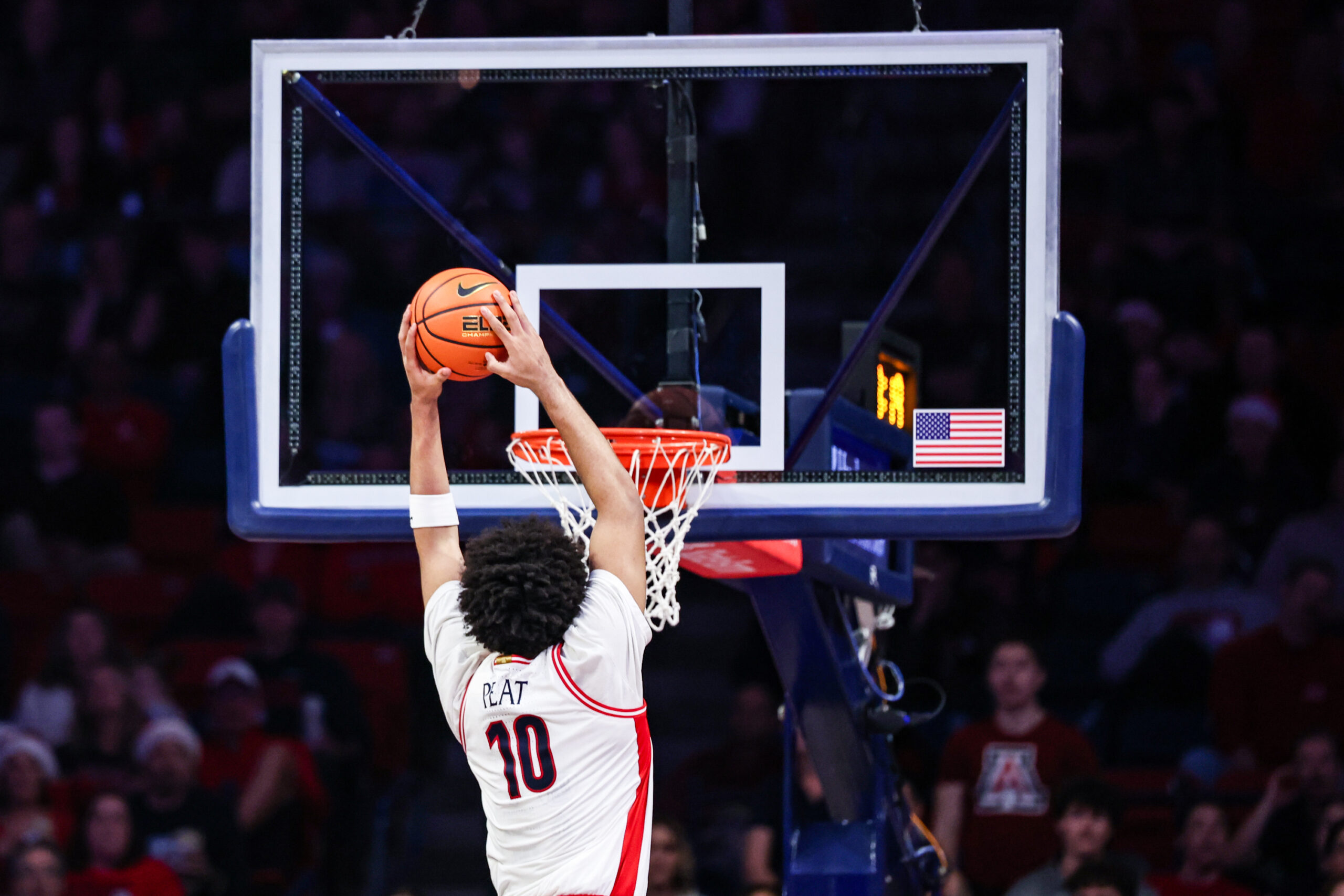 Dec 16, 2025; Tucson, Arizona, USA; Arizona Wildcats forward Koa Peat (10) dunks the ball during the first half of the game against the Abilene Christian Wildcats at McKale Memorial Center. Mandatory Credit: Aryanna Frank-Imagn Images
