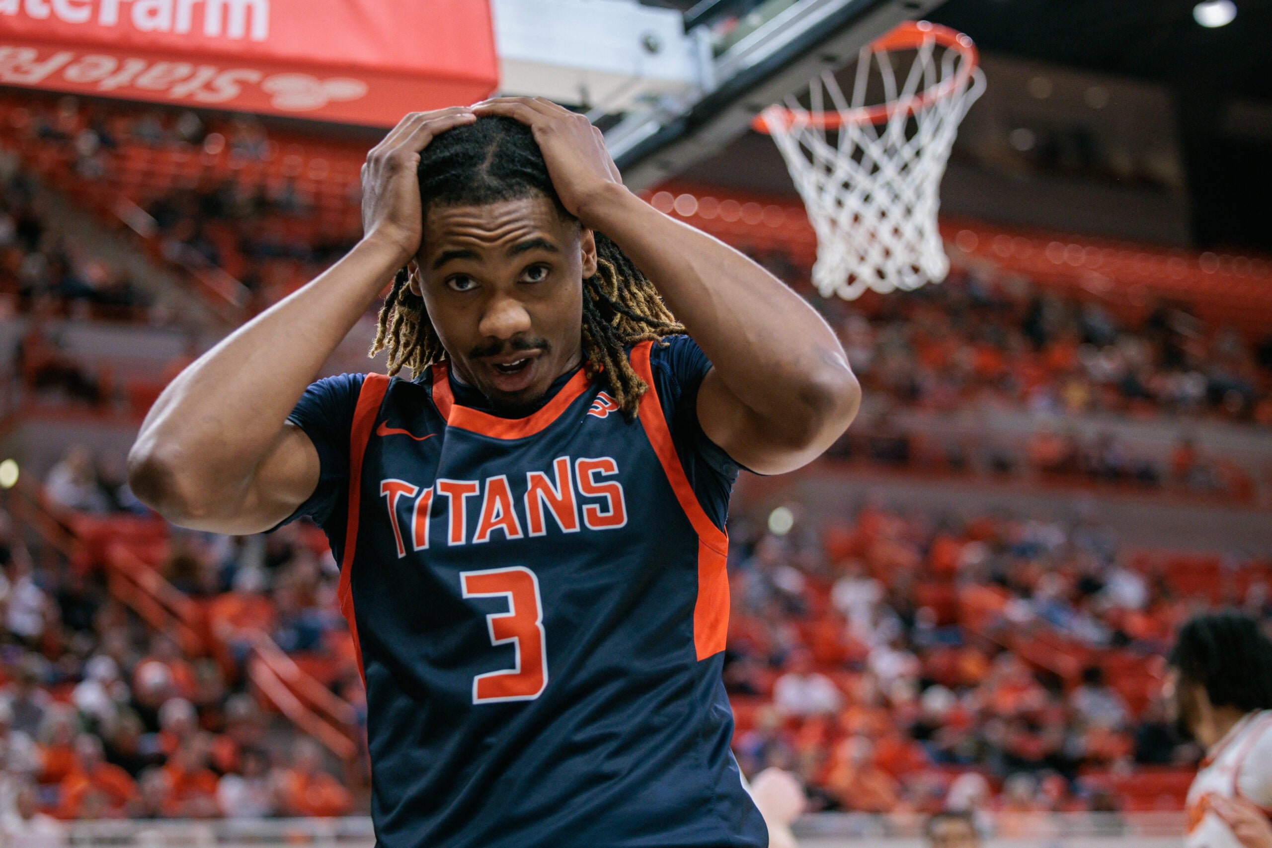 Dec 21, 2025; Stillwater, Oklahoma, USA; Cal State Fullerton Titans guard Joshua Ward (3) reacts after a play during the second half against the Oklahoma State Cowboys at Gallagher-Iba Arena. Mandatory Credit: William Purnell-Imagn Images
