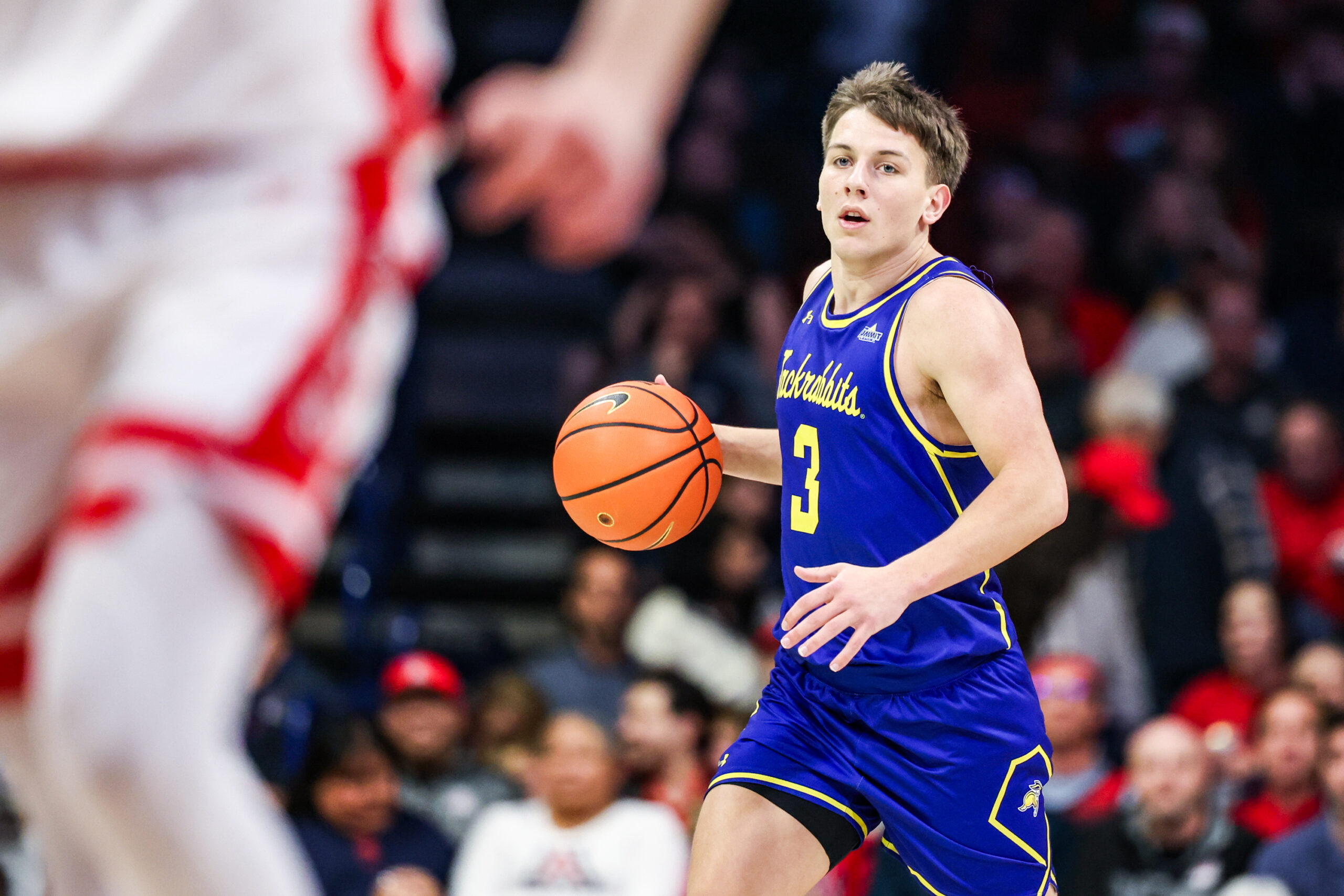 Dec 29, 2025; Tucson, Arizona, USA; South Dakota State Jackrabbits guard Joe Sayler (3) dribbles the ball down the court during the first half of the game against the South Dakota State Jackrabbits at McKale Memorial Center. Mandatory Credit: Aryanna Frank-Imagn Images