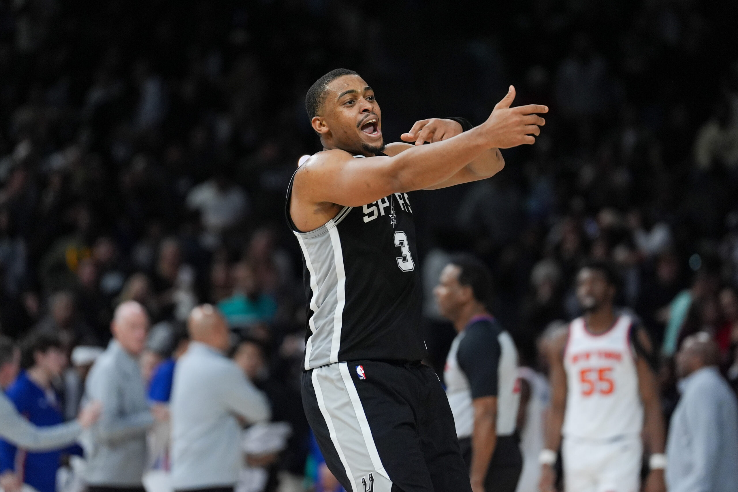 Dec 31, 2025; San Antonio, Texas, USA;  San Antonio Spurs forward Keldon Johnson (3) celebrates in the second half against the New York Knicks at Frost Bank Center. Mandatory Credit: Daniel Dunn-Imagn Images