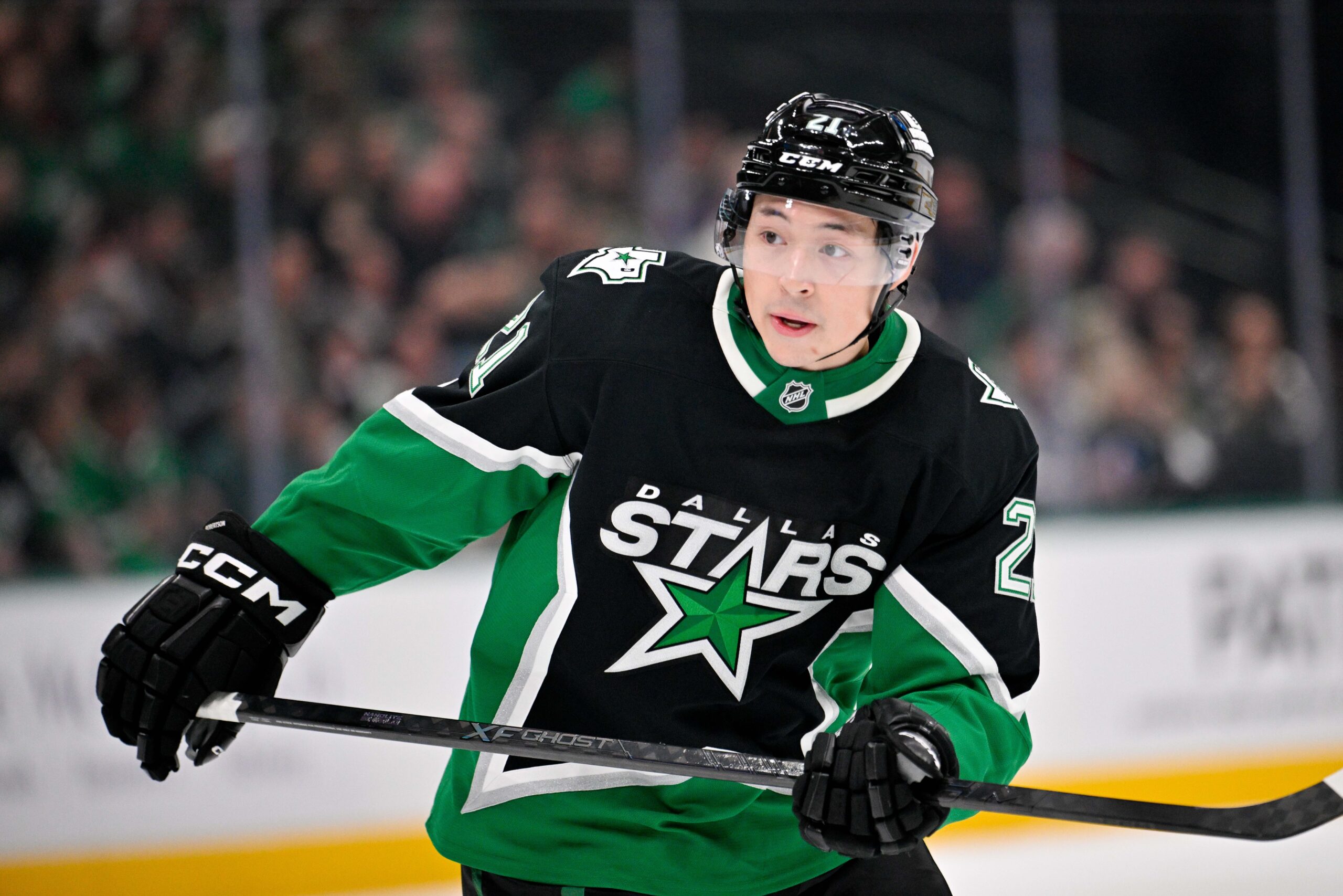 Dec 21, 2025; Dallas, Texas, USA; Dallas Stars left wing Jason Robertson (21) skates against the Toronto Maple Leafs during the game at the American Airlines Center. Mandatory Credit: Jerome Miron-Imagn Images