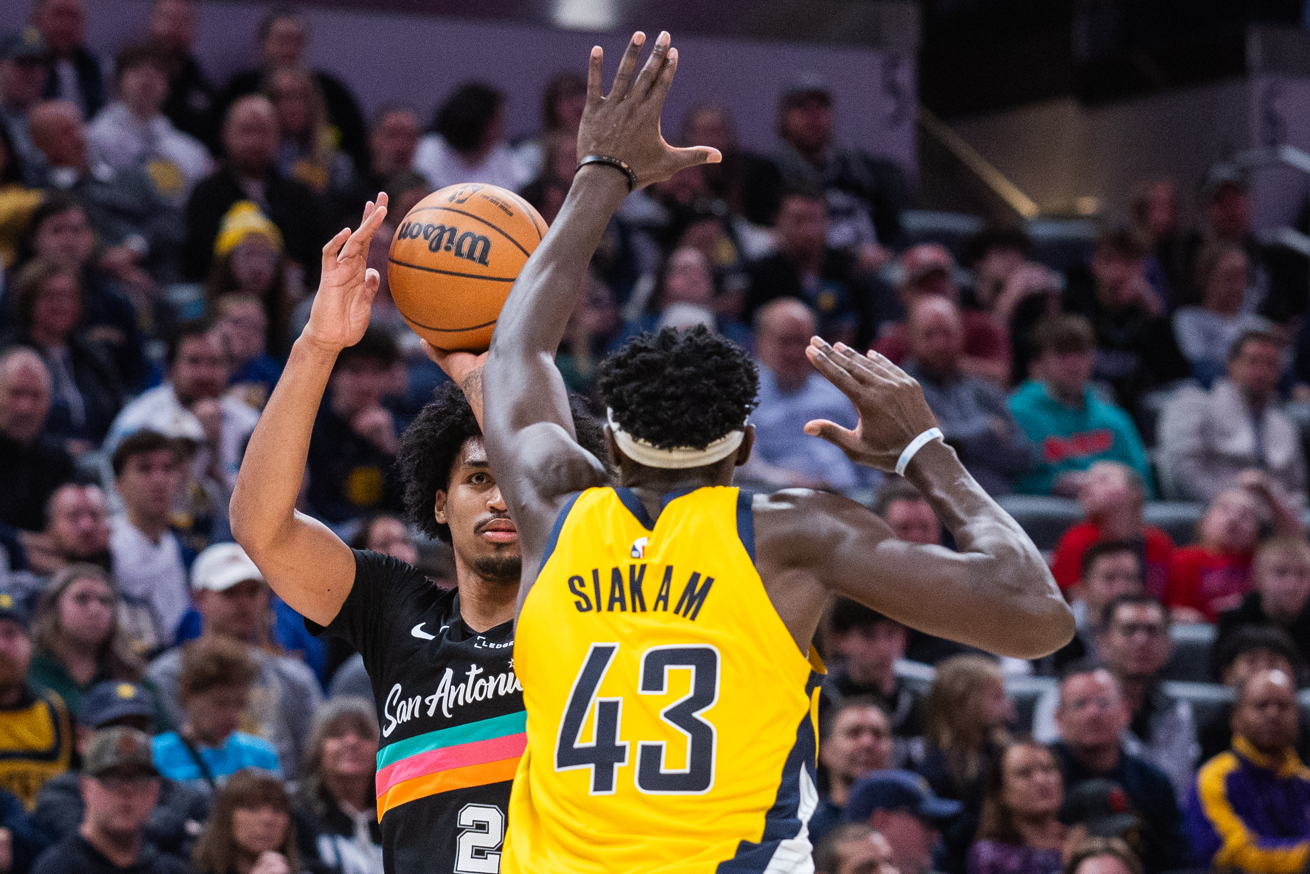 Jan 2, 2026; Indianapolis, Indiana, USA;  San Antonio Spurs guard Dylan Harper (2) shoots the ball while Indiana Pacers forward Pascal Siakam (43) defends in the second half at Gainbridge Fieldhouse. Mandatory Credit: Trevor Ruszkowski-Imagn Images