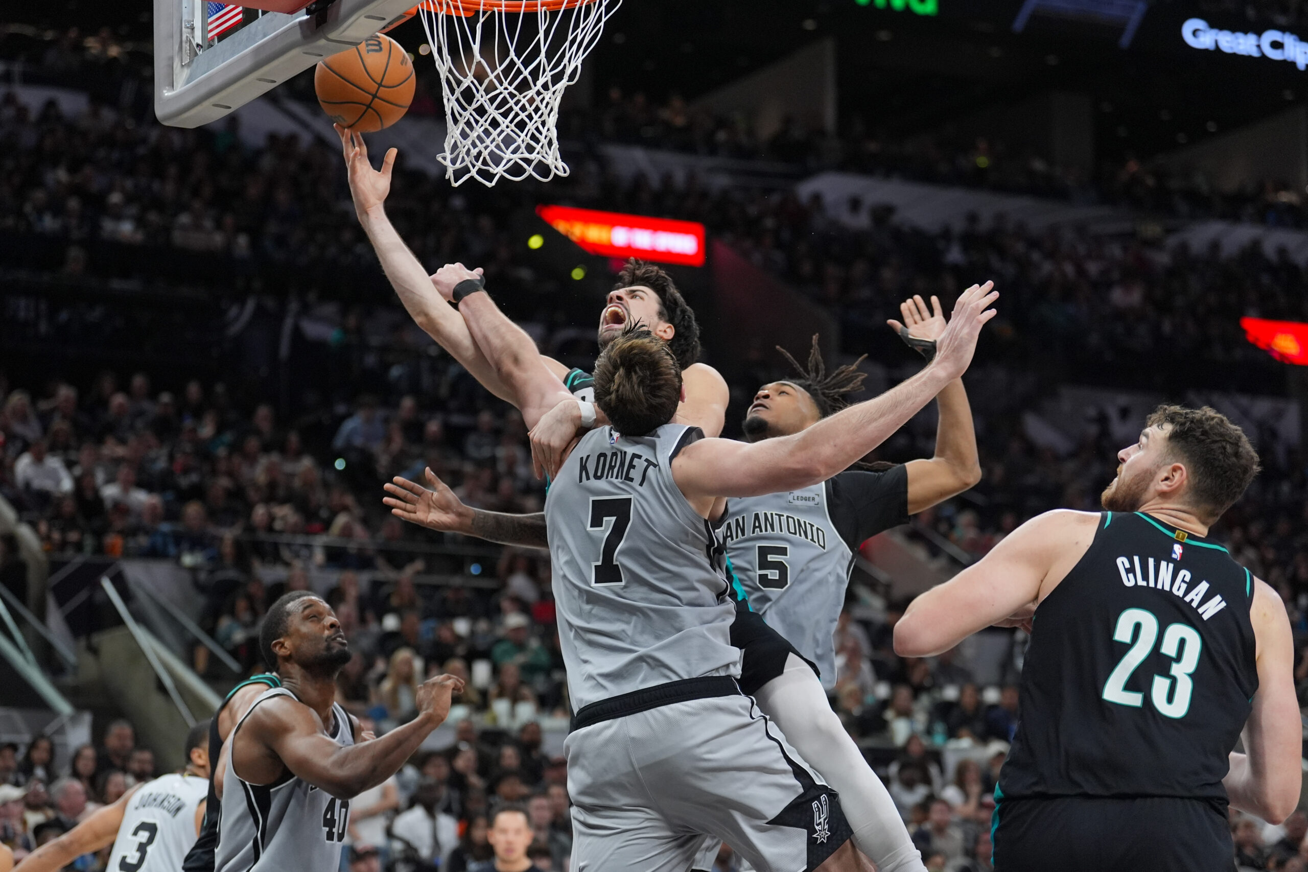 Jan 3, 2026; San Antonio, Texas, USA;  Portland Trail Blazers forward Deni Avdija (8) shoots against San Antonio Spurs center/forward Luke Kornet (7) in the second half at Frost Bank Center. Mandatory Credit: Daniel Dunn-Imagn Images