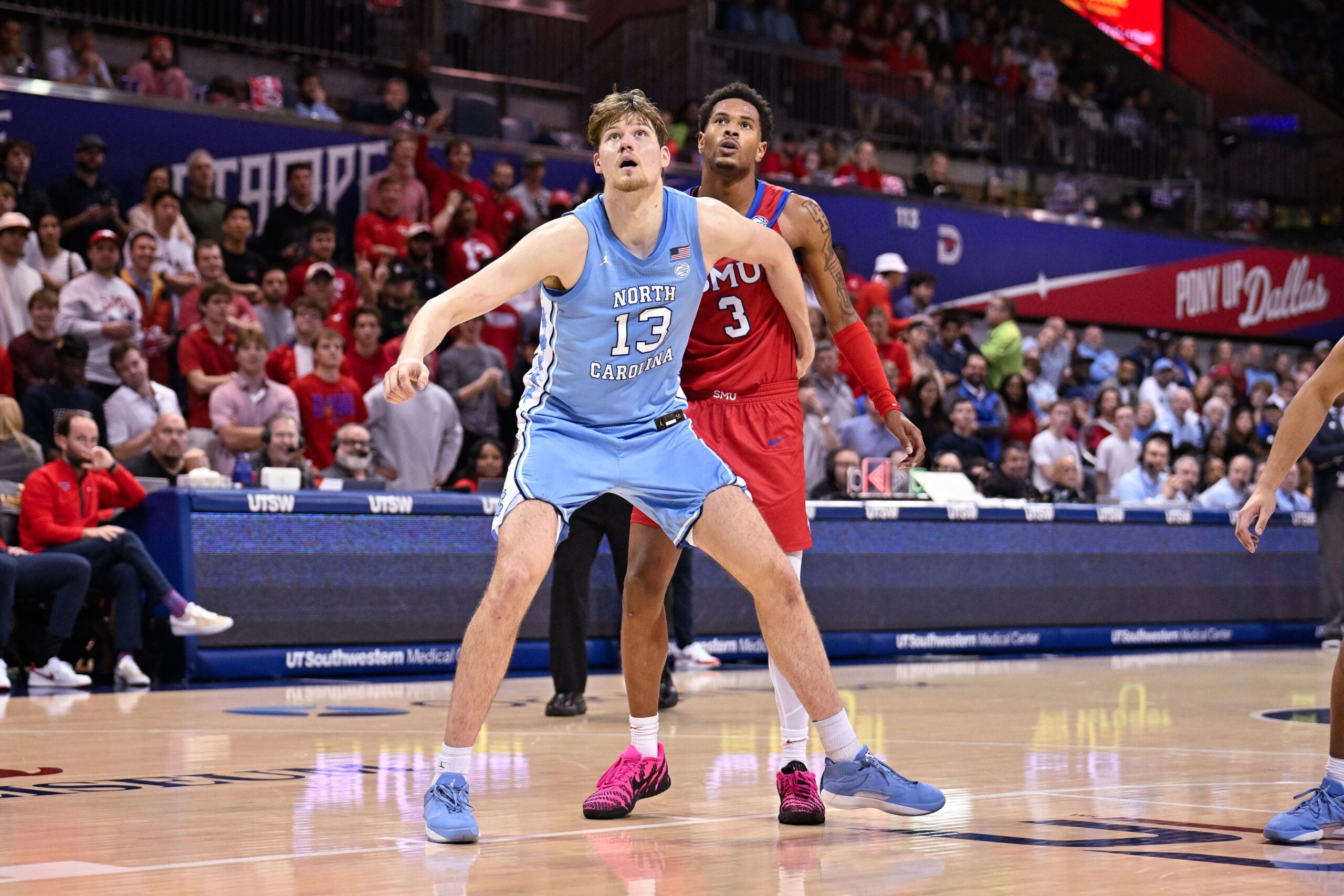 Jan 3, 2026; Dallas, Texas, USA; North Carolina Tar Heels center Henri Veesaar (13) and SMU Mustangs forward Corey Washington (3) look on during the game between the Mustangs and the Tar Heels at Moody Coliseum. Mandatory Credit: Jerome Miron-Imagn Images