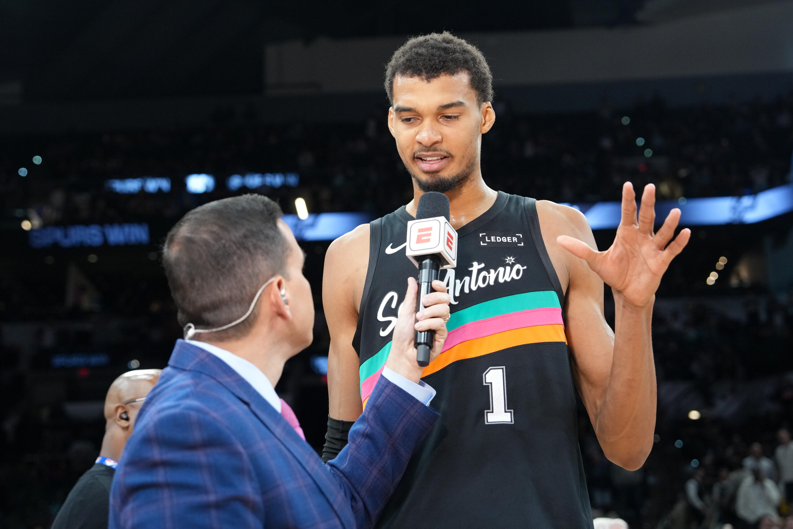 Jan 7, 2026; San Antonio, Texas, USA;  San Antonio Spurs forward/center Victor Wembanyama (1) gives and interview after the game against the Los Angeles Lakers at Frost Bank Center. Mandatory Credit: Daniel Dunn-Imagn Images