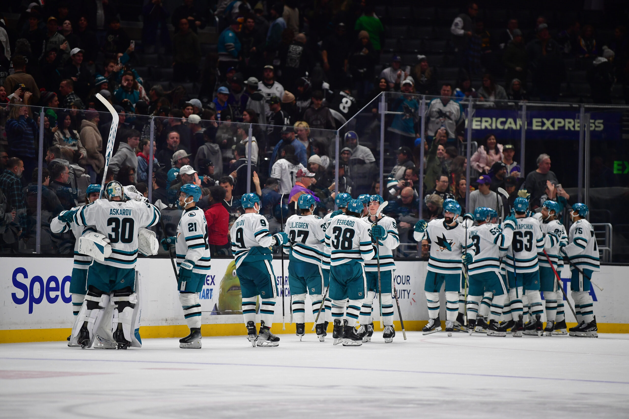 Jan 7, 2026; Los Angeles, California, USA; San Jose Sharks celebrate the overtime victory against the Los Angeles Kings at Crypto.com Arena. Mandatory Credit: Gary A. Vasquez-Imagn Images