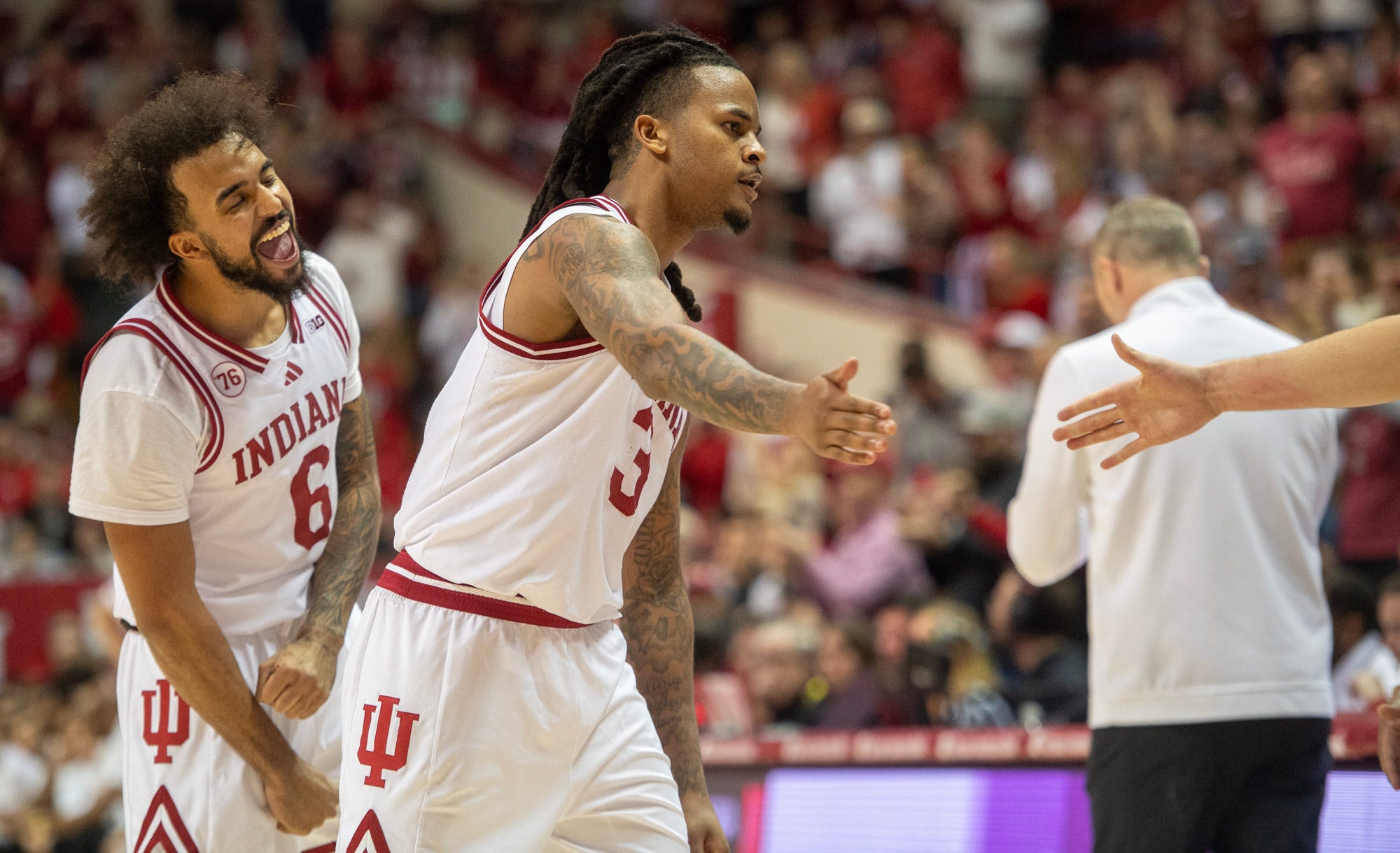 Indiana's Tayton Conerway (6) cheers as Lamar Wilkerson (3) celebrates after his basket and foul during the Indiana versus Nebraska mens basketball game at Simon Skjodt Assembly Hall on Saturday, Jan. 10, 2026.