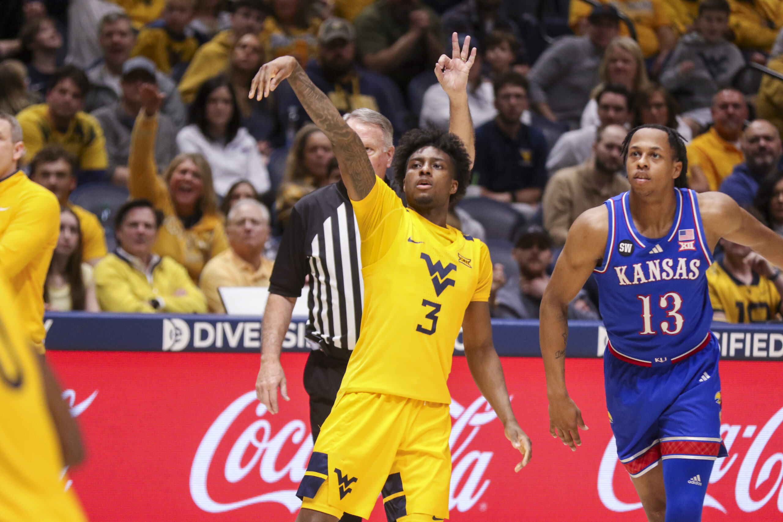 Jan 10, 2026; Morgantown, West Virginia, USA; West Virginia Mountaineers guard Honor Huff (3) shoots a three pointer during the second half against the Kansas Jayhawks at Hope Coliseum. Mandatory Credit: Ben Queen-Imagn Images
