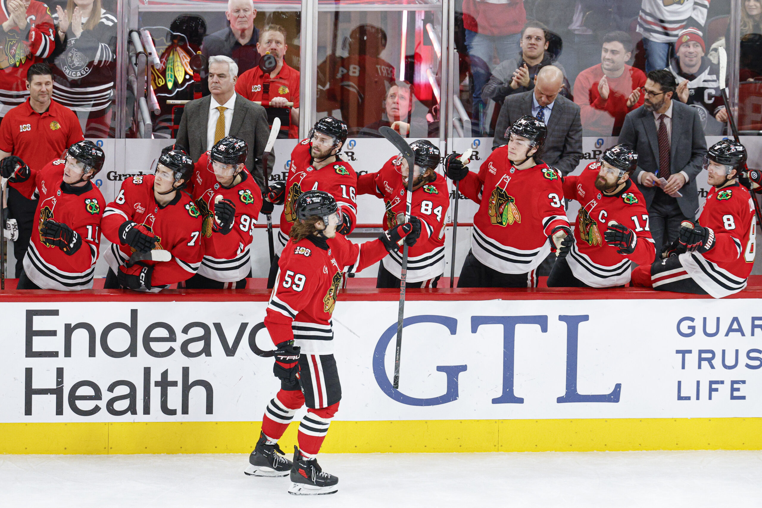 Jan 12, 2026; Chicago, Illinois, USA; Chicago Blackhawks left wing Tyler Bertuzzi (59) celebrates with teammates after scoring against the Edmonton Oilers during the third period at United Center. Mandatory Credit: Kamil Krzaczynski-Imagn Images