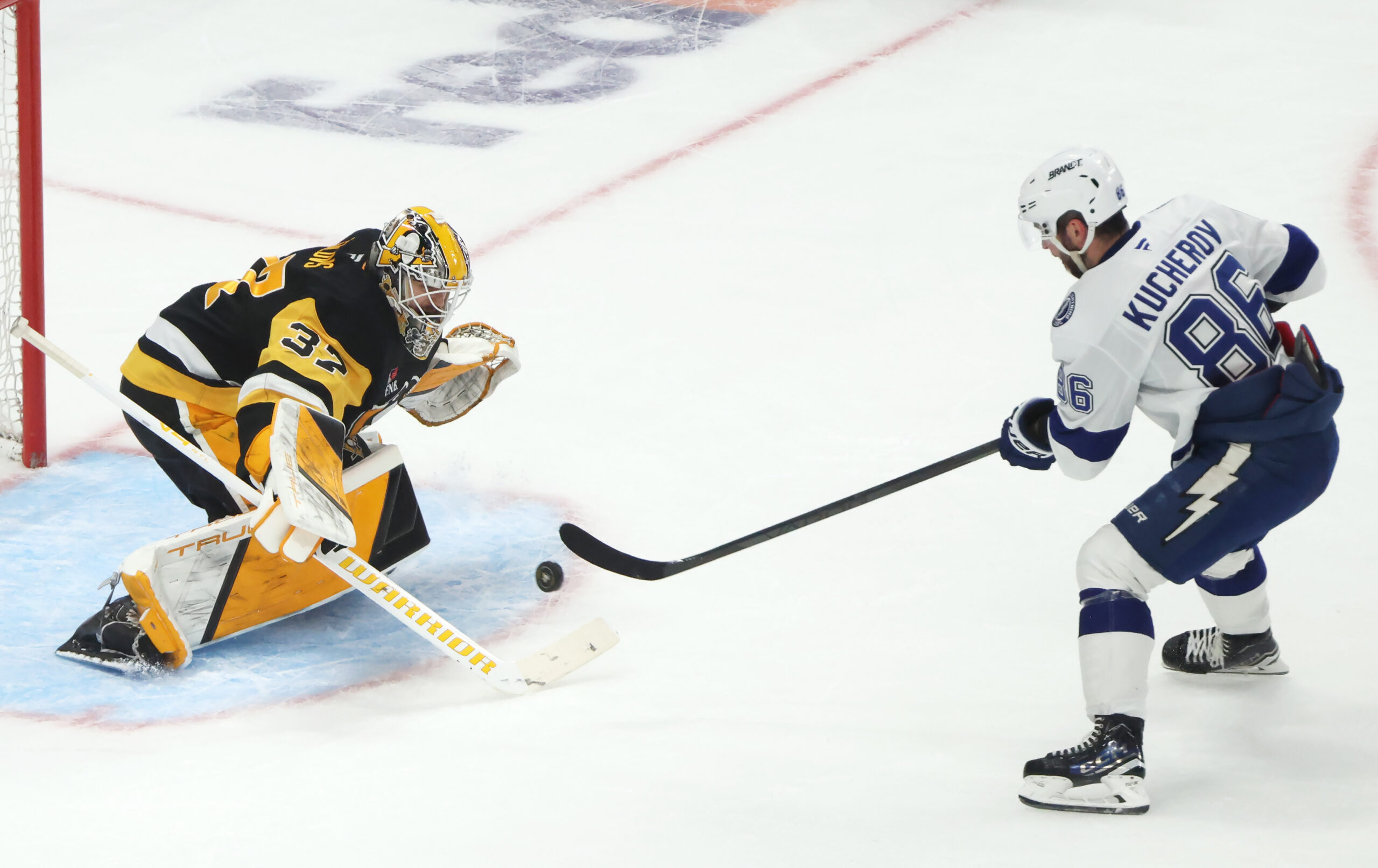 Jan 13, 2026; Pittsburgh, Pennsylvania, USA;  Tampa Bay Lightning right wing Nikita Kucherov (86) scores a game winning shootout goal against Pittsburgh Penguins goaltender Arturs Silovs (37) at PPG Paints Arena. Mandatory Credit: Charles LeClaire-Imagn Images