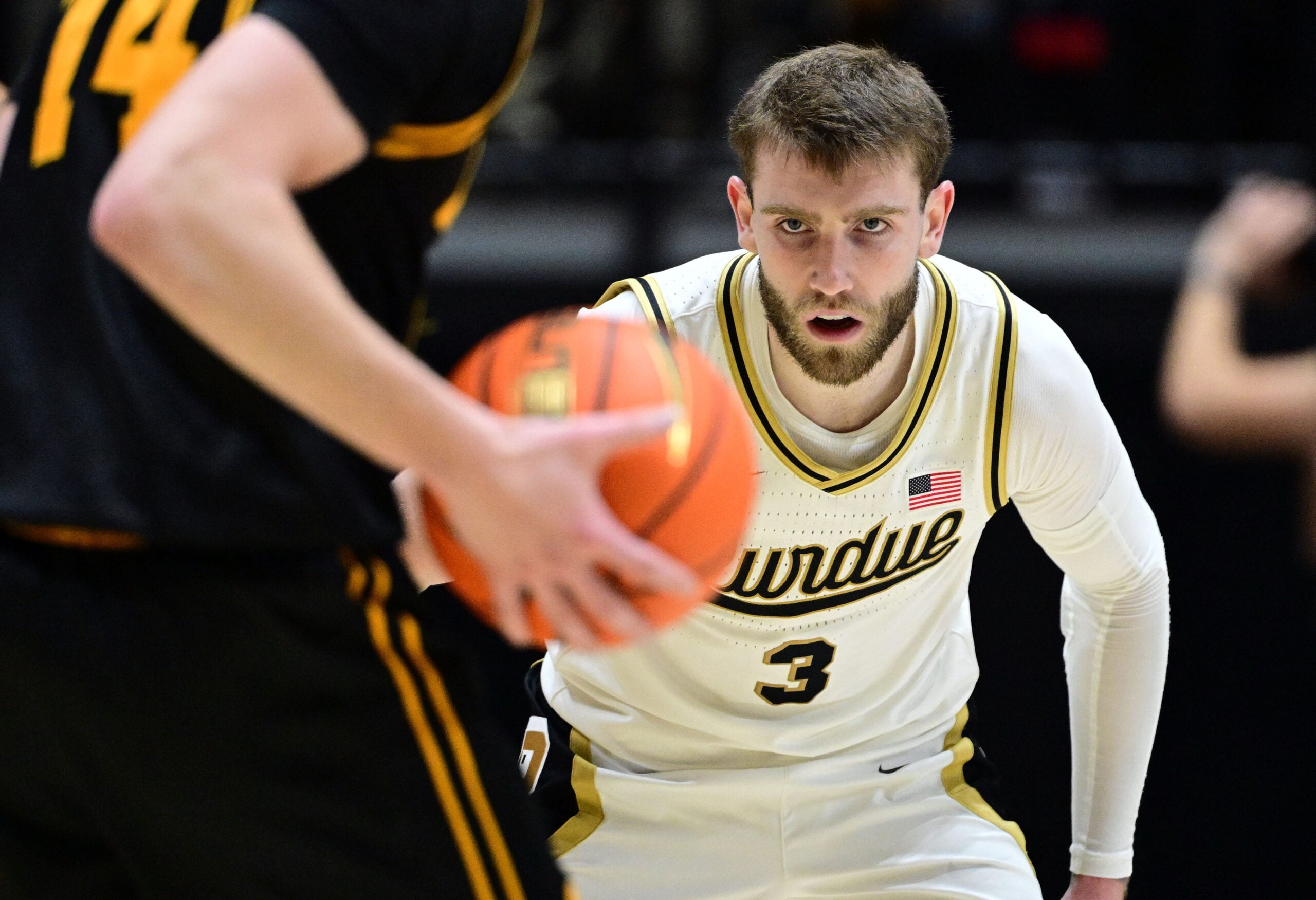 Jan 14, 2026; West Lafayette, Indiana, USA; Purdue Boilermakers guard Braden Smith (3) defends against Iowa Hawkeyes guard Bennett Stirtz (14) during the second half at Mackey Arena. Mandatory Credit: Marc Lebryk-Imagn Images