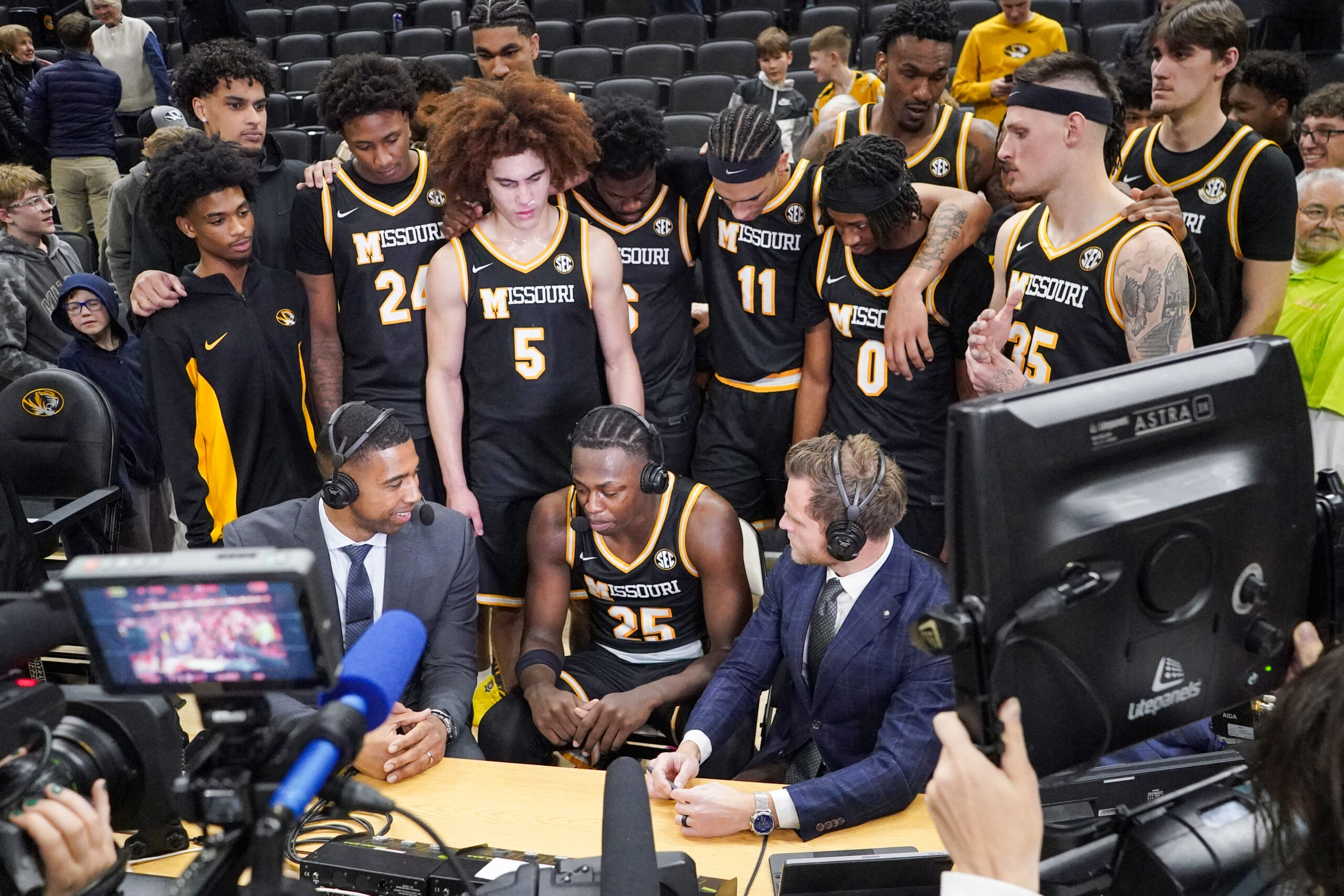 Jan 14, 2026; Columbia, Missouri, USA; Missouri Tigers guard Mark Mitchell (25) is interviewed by media after the game against the Auburn Tigers at Mizzou Arena. Mandatory Credit: Denny Medley-Imagn Images