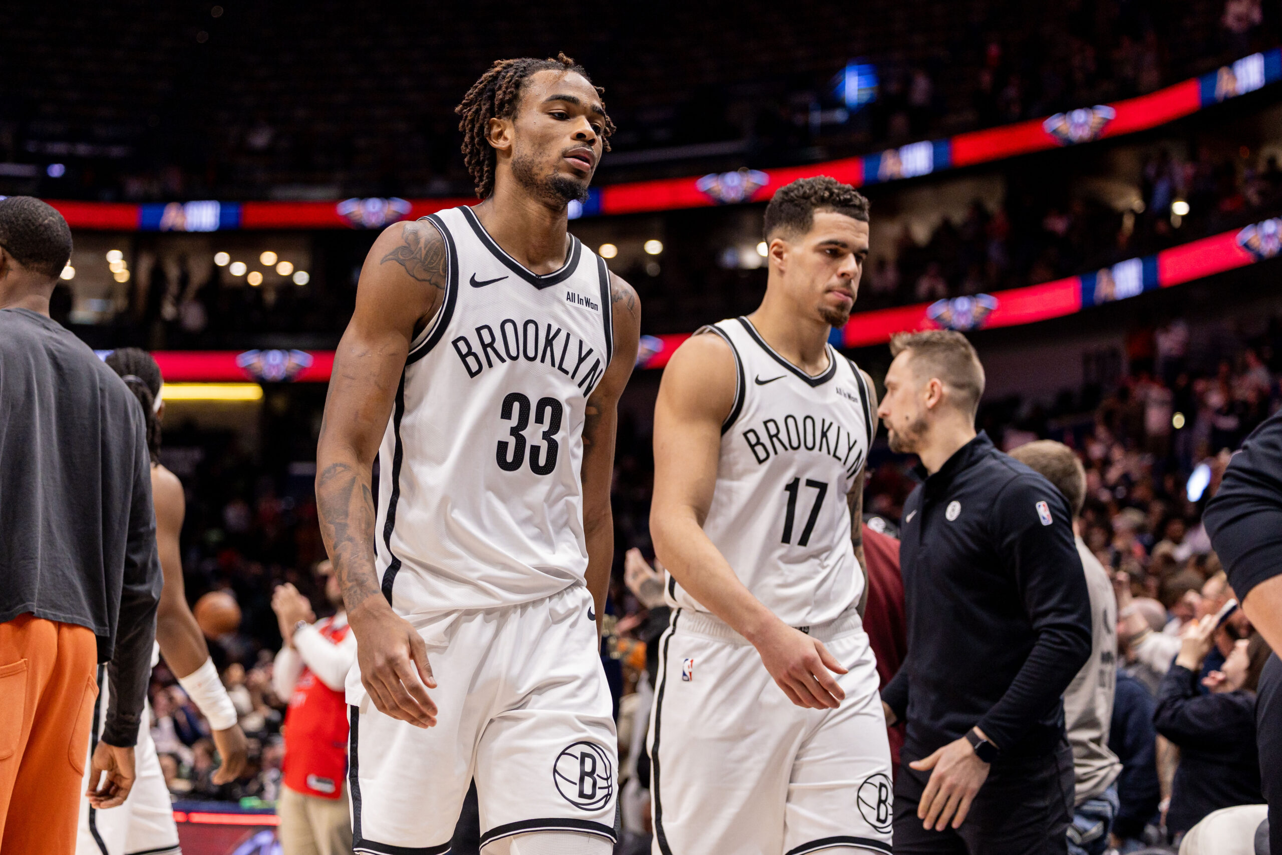 Jan 14, 2026; New Orleans, Louisiana, USA;  Brooklyn Nets forward Michael Porter Jr. (17) and center Nic Claxton (33) head to the locker room after the game against the New Orleans Pelicans at Smoothie King Center. Mandatory Credit: Stephen Lew-Imagn Images