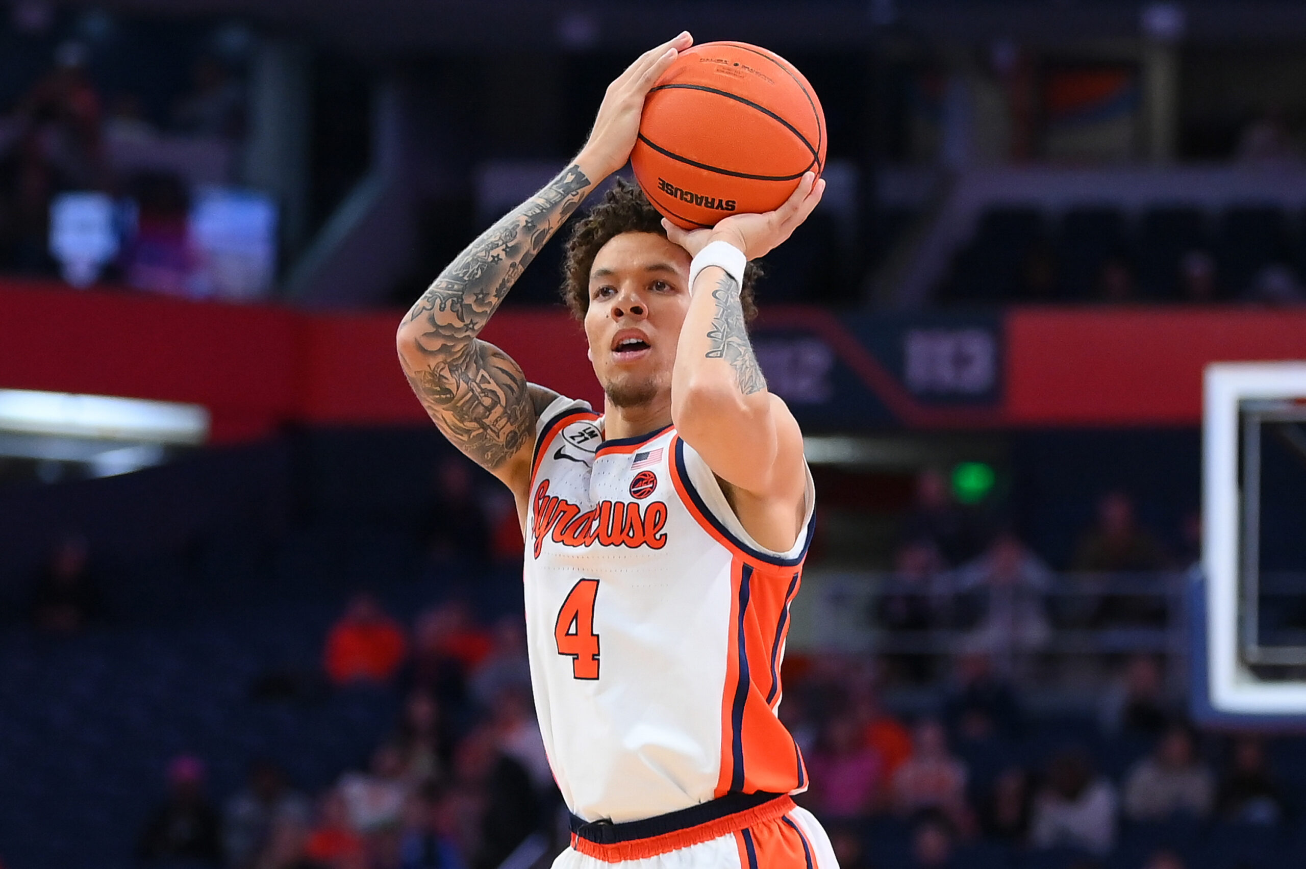 Jan 13, 2026; Syracuse, New York, USA; Syracuse Orange guard Nate Kingz (4) shoots during the second half against the Florida State Seminoles at the JMA Wireless Dome. Mandatory Credit: Rich Barnes-Imagn Images
