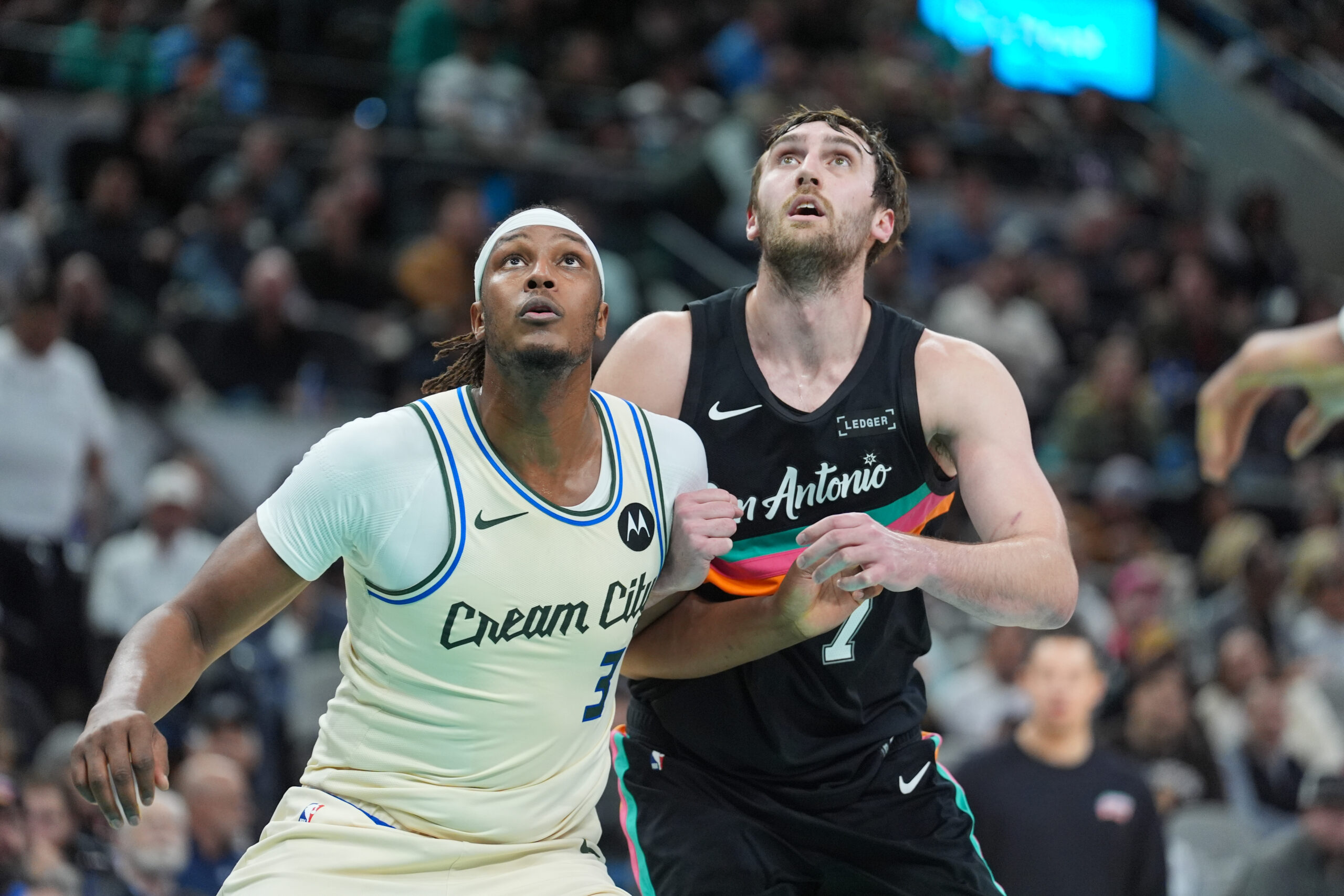 Jan 15, 2026; San Antonio, Texas, USA;  Milwaukee Bucks center/forward Myles Turner (3) and San Antonio Spurs center/forward Luke Kornet (7) look to get a rebound in the first half at Frost Bank Center. Mandatory Credit: Daniel Dunn-Imagn Images