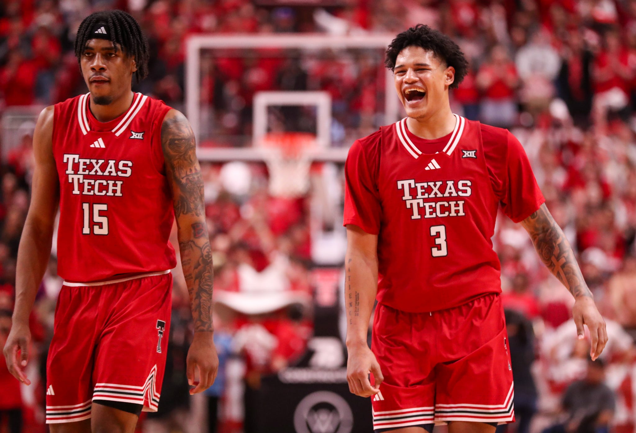Texas Tech players JT Toppin and LeJuan Watts look on after a play against BYU during a Big 12 Conference men's basketball game, Saturday, Jan. 17, 2026, in United Supermarkets Arena.