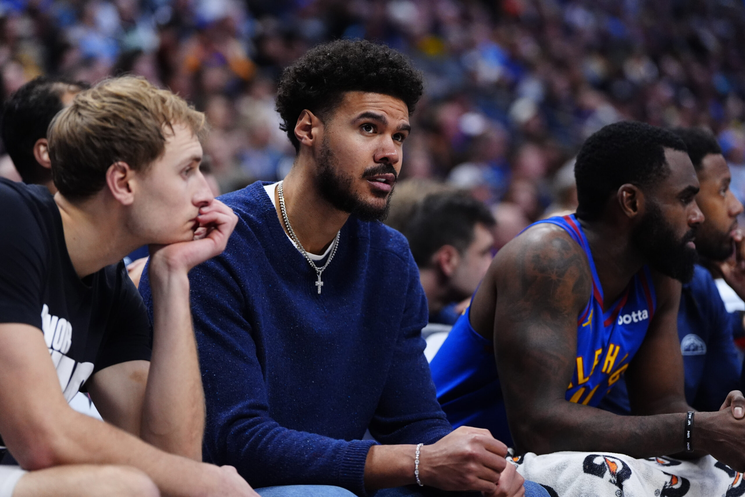 Jan 18, 2026; Denver, Colorado, USA; Denver Nuggets forward Cameron Johnson (23) on the bench in the second quarter against the Charlotte Hornets at Ball Arena. Mandatory Credit: Ron Chenoy-Imagn Images