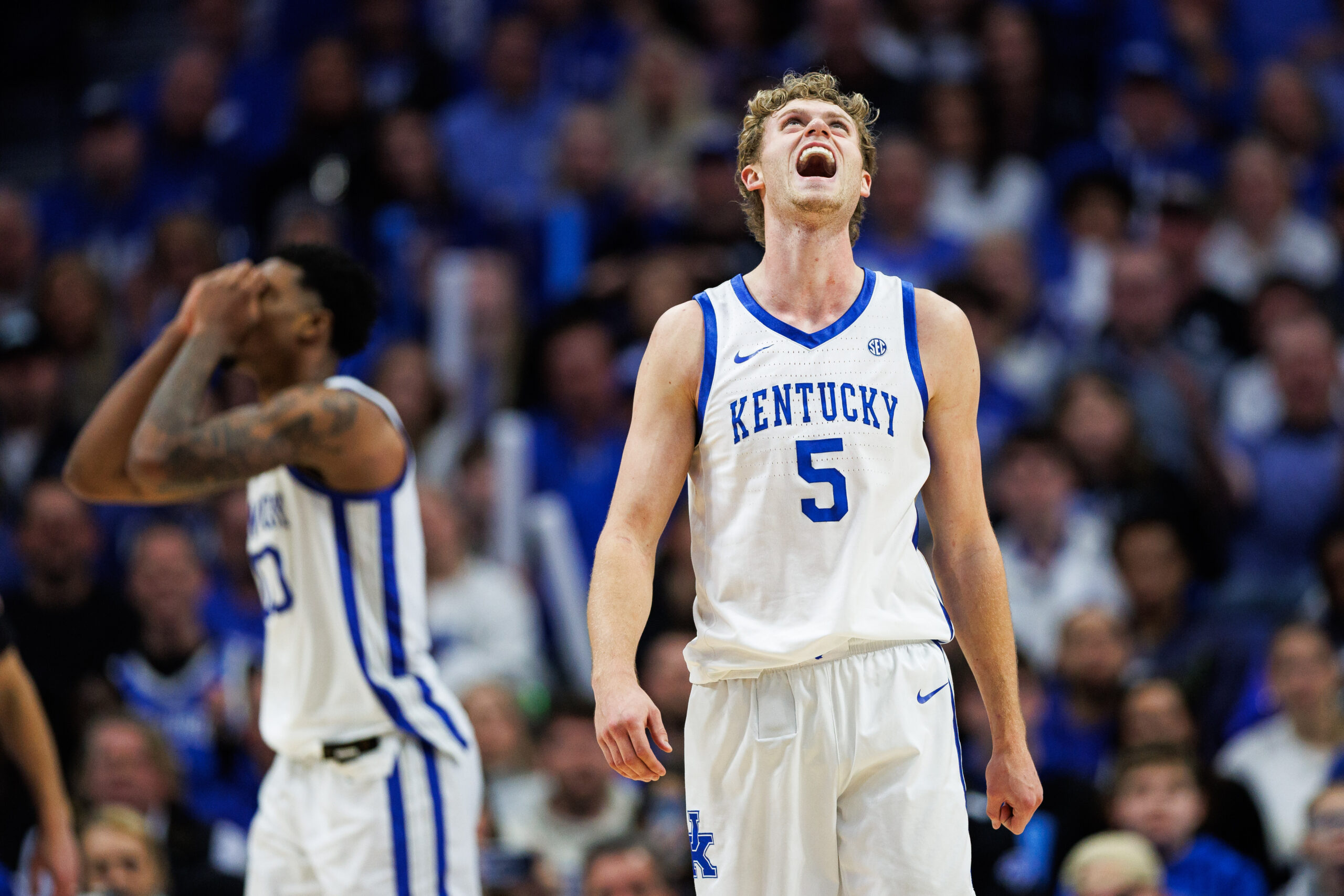 Jan 21, 2026; Lexington, Kentucky, USA; Kentucky Wildcats guard Collin Chandler (5) reacts after guard Otega Oweh is called for his fourth foul during the second half against the Texas Longhorns at Rupp Arena at Central Bank Center. Mandatory Credit: Jordan Prather-Imagn Images