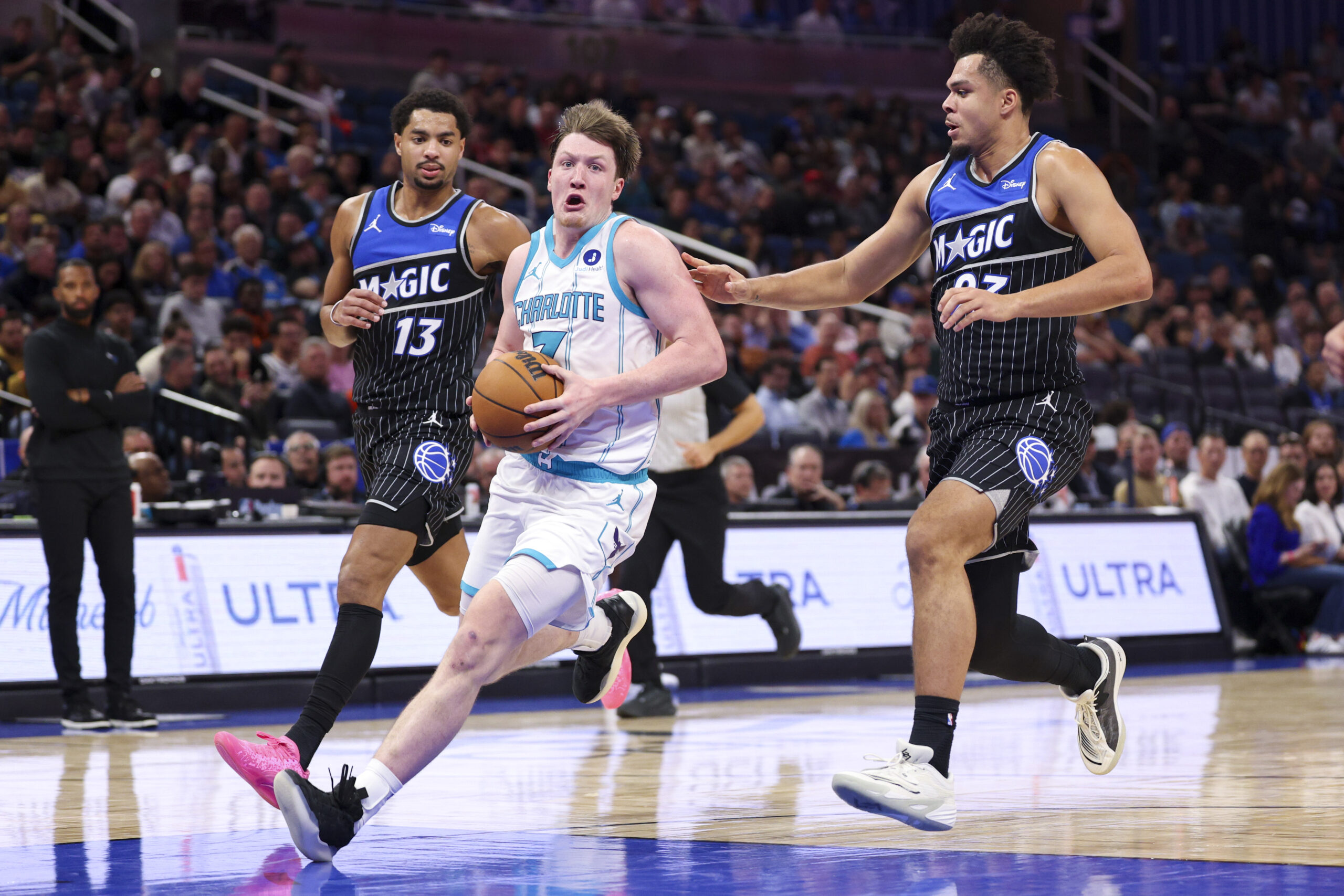 Jan 22, 2026; Orlando, Florida, USA; Charlotte Hornets guard Kon Knueppel (7) drives to the basket against the Orlando Magic in the fourth quarter  at Kia Center. Mandatory Credit: Nathan Ray Seebeck-Imagn Images