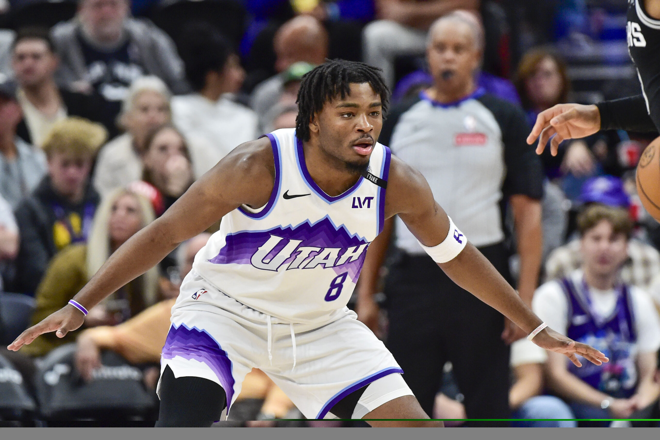 Jan 22, 2026; Salt Lake City, Utah, USA; Utah Jazz guard Isaiah Collier (8) defends against the San Antonio Spurs during the second half at Delta Center. Mandatory Credit: Peter Creveling-Imagn Images
