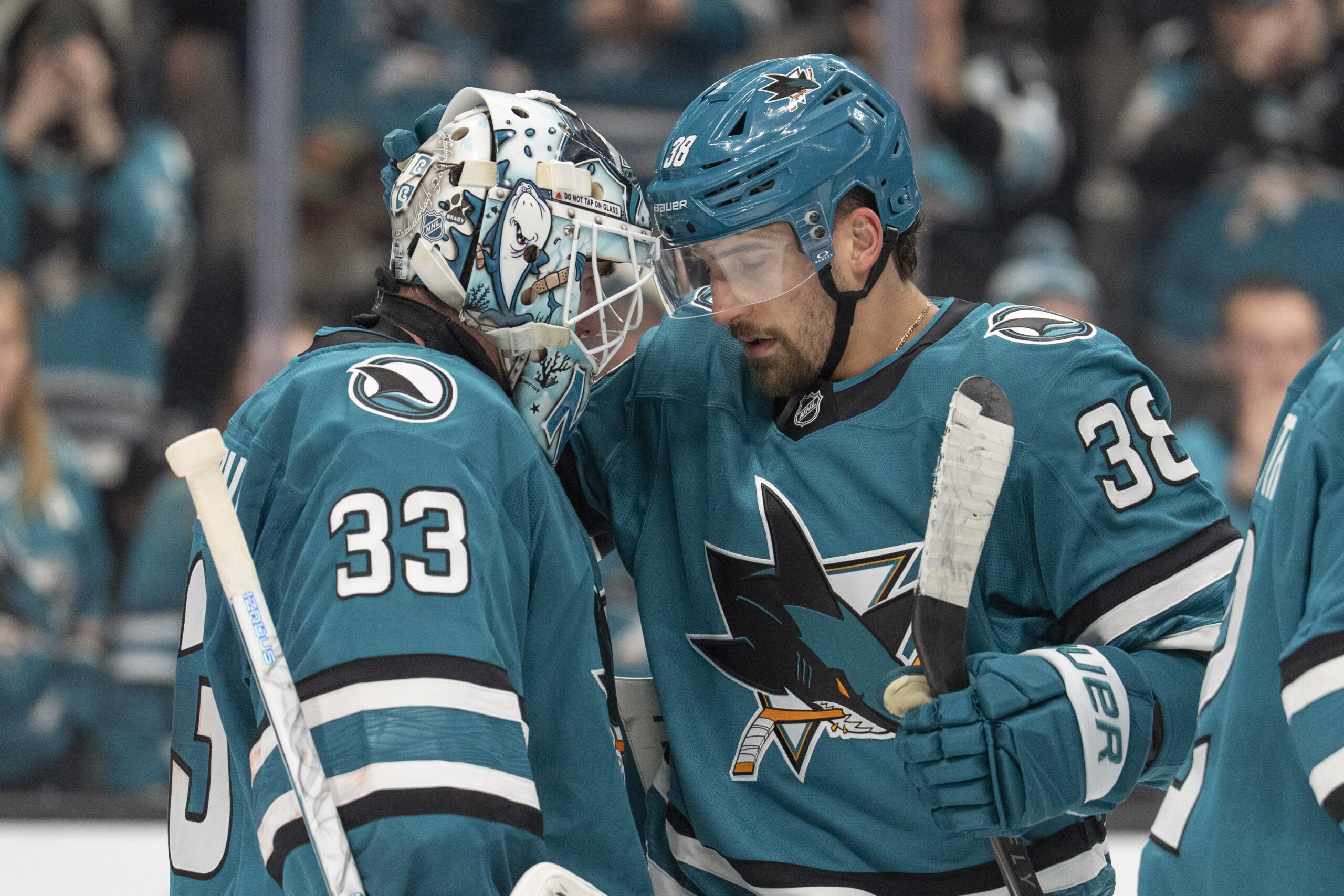 Jan 23, 2026; San Jose, California, USA;  San Jose Sharks defenseman Mario Ferraro (38) celebrates with San Jose Sharks goaltender Alex Nedeljkovic (33) after defeating the New York Rangers at SAP Center at San Jose. Mandatory Credit: Stan Szeto-Imagn Images