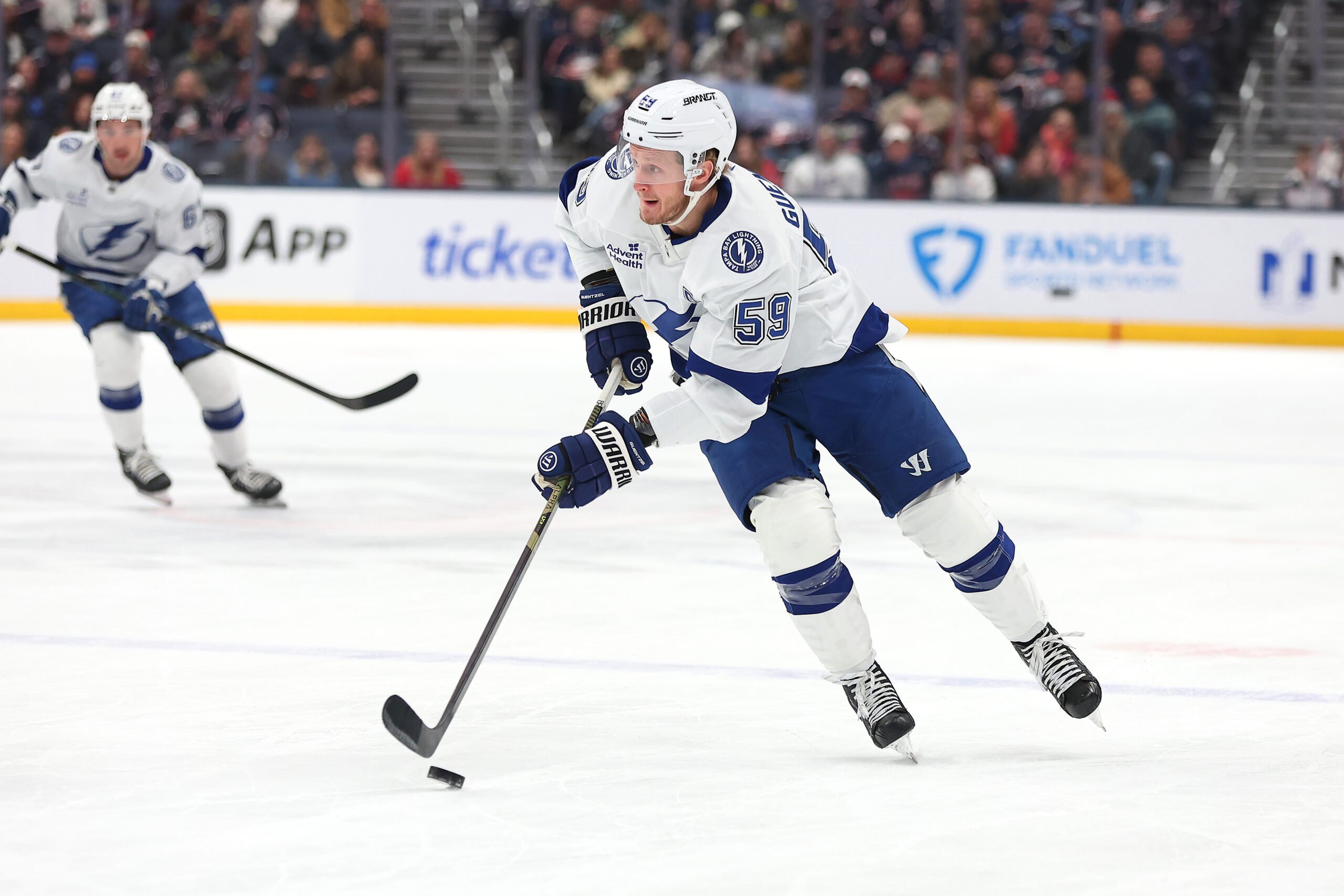 Jan 24, 2026; Columbus, Ohio, USA;  Tampa Bay Lightning center Jake Guentzel (59) looks to pass the puck during the first period against the Columbus Blue Jackets at Nationwide Arena. Mandatory Credit: Joseph Maiorana-Imagn Images