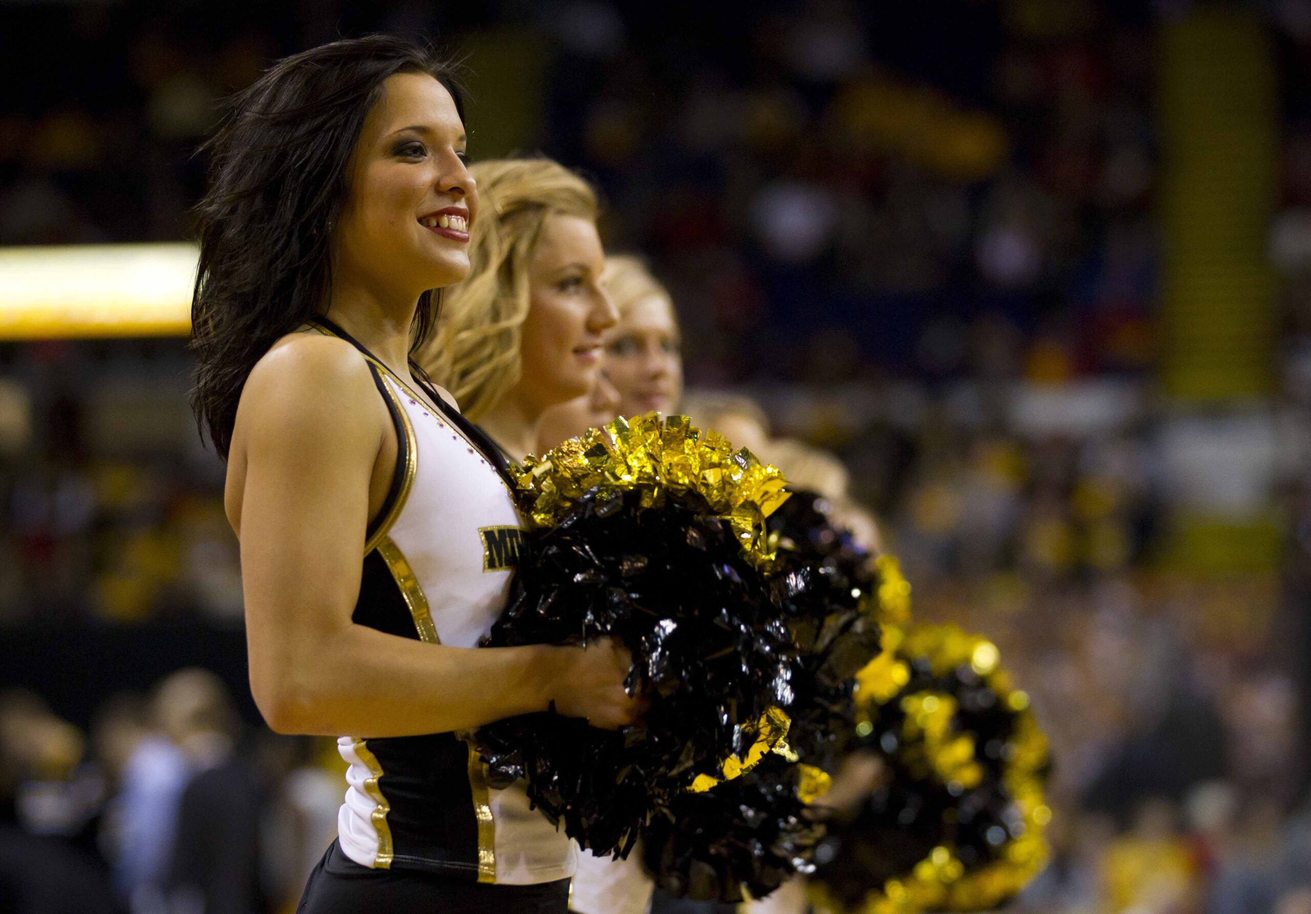 Dec 13, 2011; Milwaukee, WI, USA; Milwaukee Panthers cheerleaders perform during the game against the Wisconsin Badgers at the US Cellular Arena.  Wisconsin defeated Milwaukee 60-54.  Mandatory Credit: Jeff Hanisch-Imagn Images