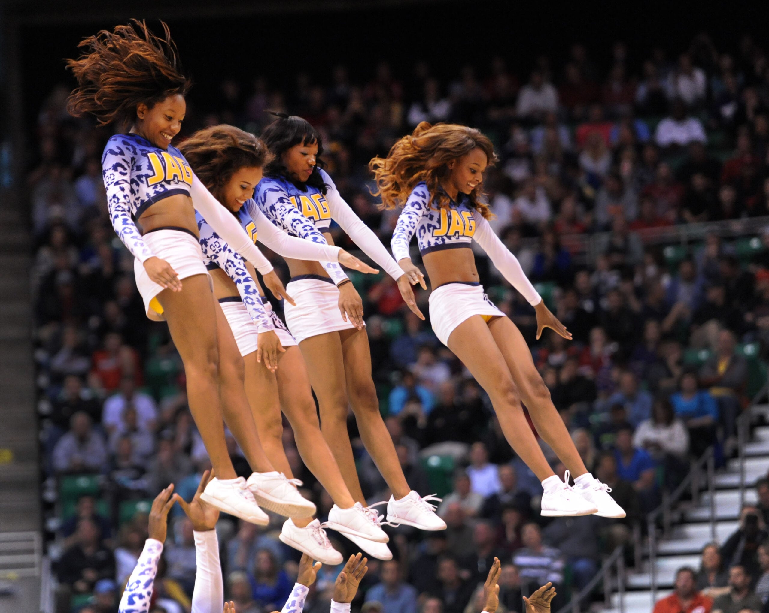 Mar 21, 2013; Salt Lake City, UT, USA; Members of the Southern University Jaguars cheerleaders perform in the second half of the game against the Gonzaga Bulldogs during the second round of the 2013 NCAA tournament at EnergySolutions Arena. Gonzaga won the game 64-58. Mandatory Credit: Steve Dykes-Imagn Images