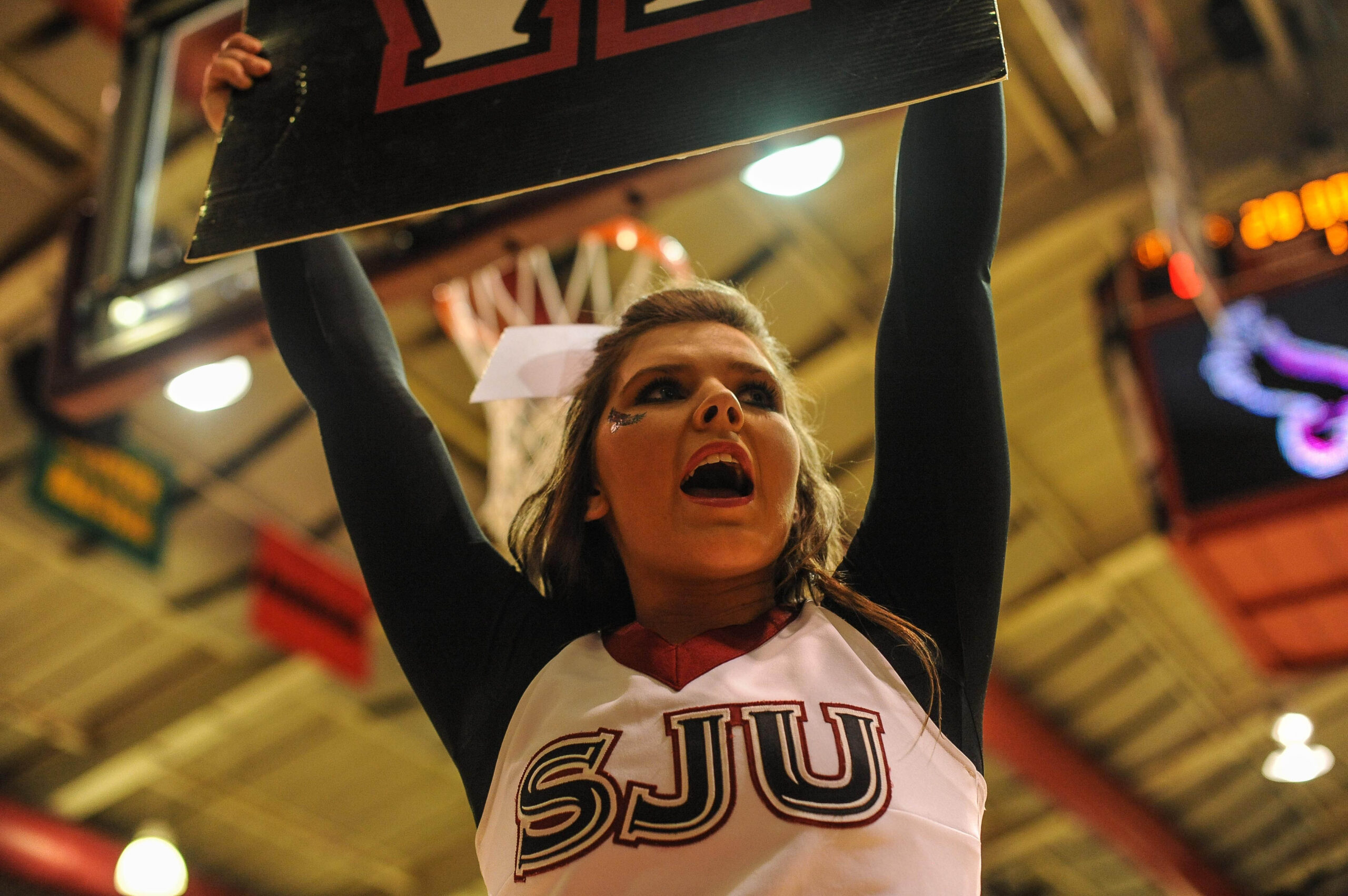 Feb 5, 2014; Philadelphia, PA, USA; A Saint Joseph's Hawks cheerleader during the 1st half of the game against  the Saint Louis Billikens at Hagan Arena. Mandatory Credit: John Geliebter-Imagn Images