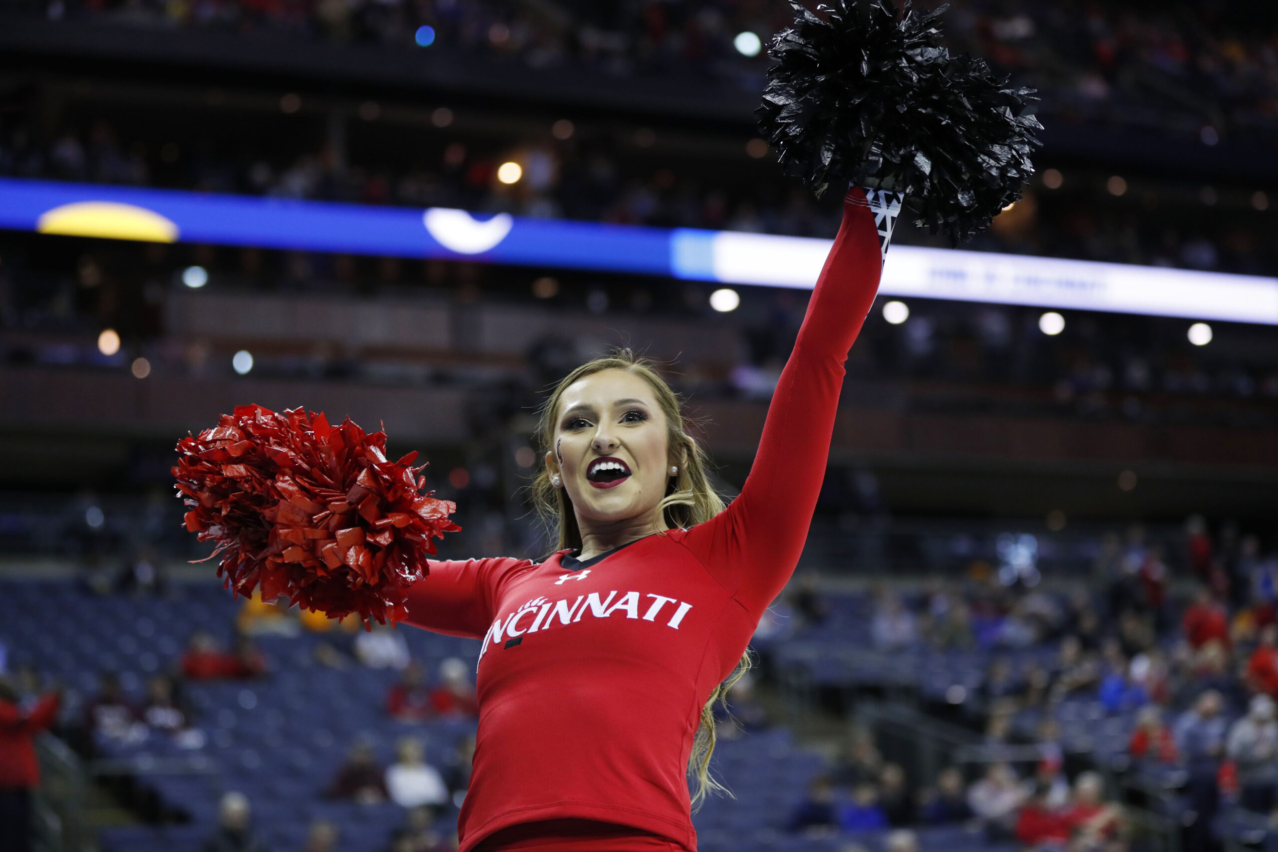 Mar 22, 2019; Columbus, OH, USA; Cincinnati Bearcats cheerleader before the game against the Iowa Hawkeyes in the first round of the 2019 NCAA Tournament at Nationwide Arena. Mandatory Credit: Rick Osentoski-Imagn Images