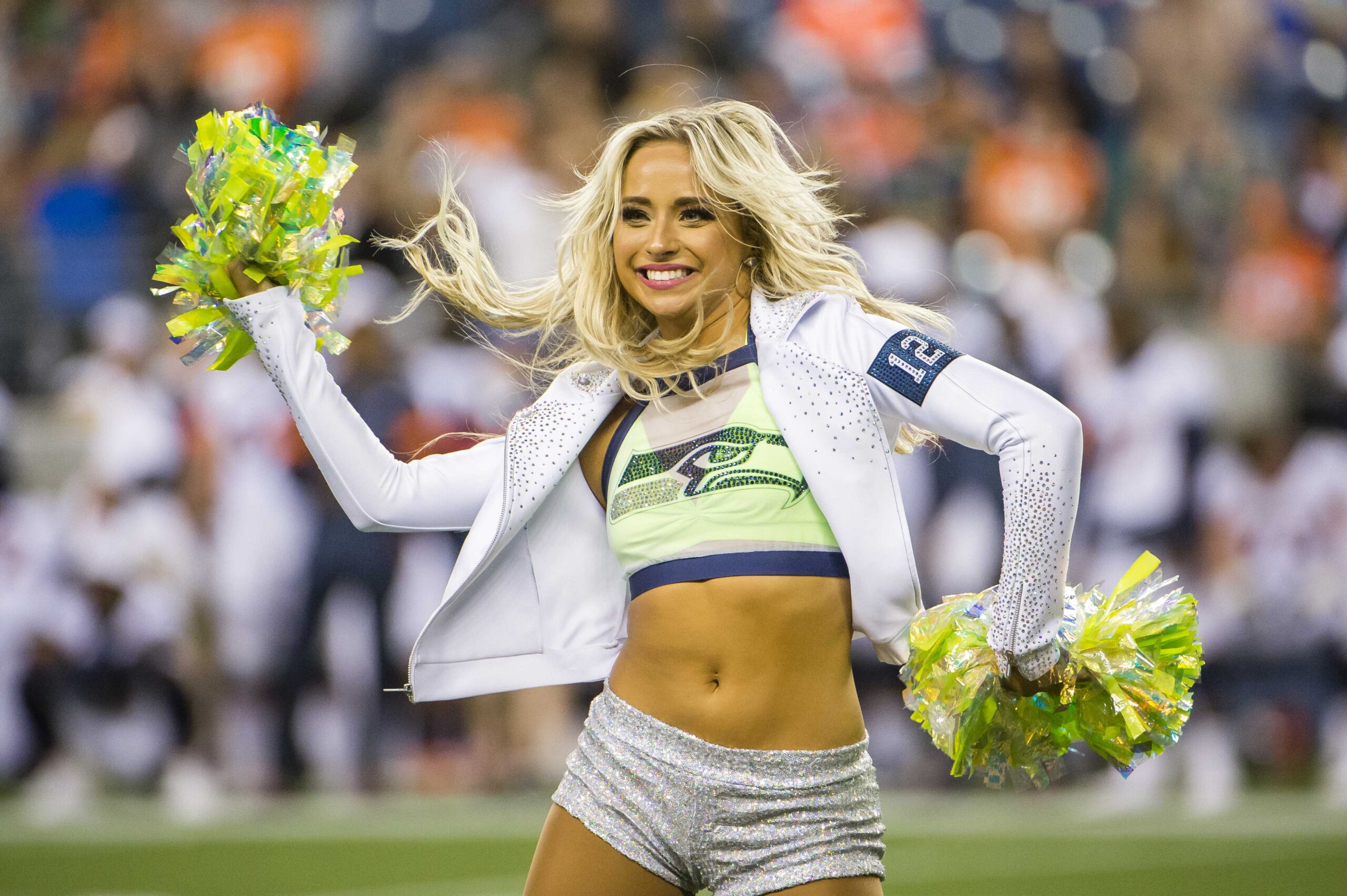 Aug 8, 2019; Seattle, WA, USA; A Seattle Seahawks cheerleader dances during a timeout during the second half against the Denver Broncos at CenturyLink Field. The Seahawks beat the Broncos 22-14. Mandatory Credit: Troy Wayrynen-Imagn Images