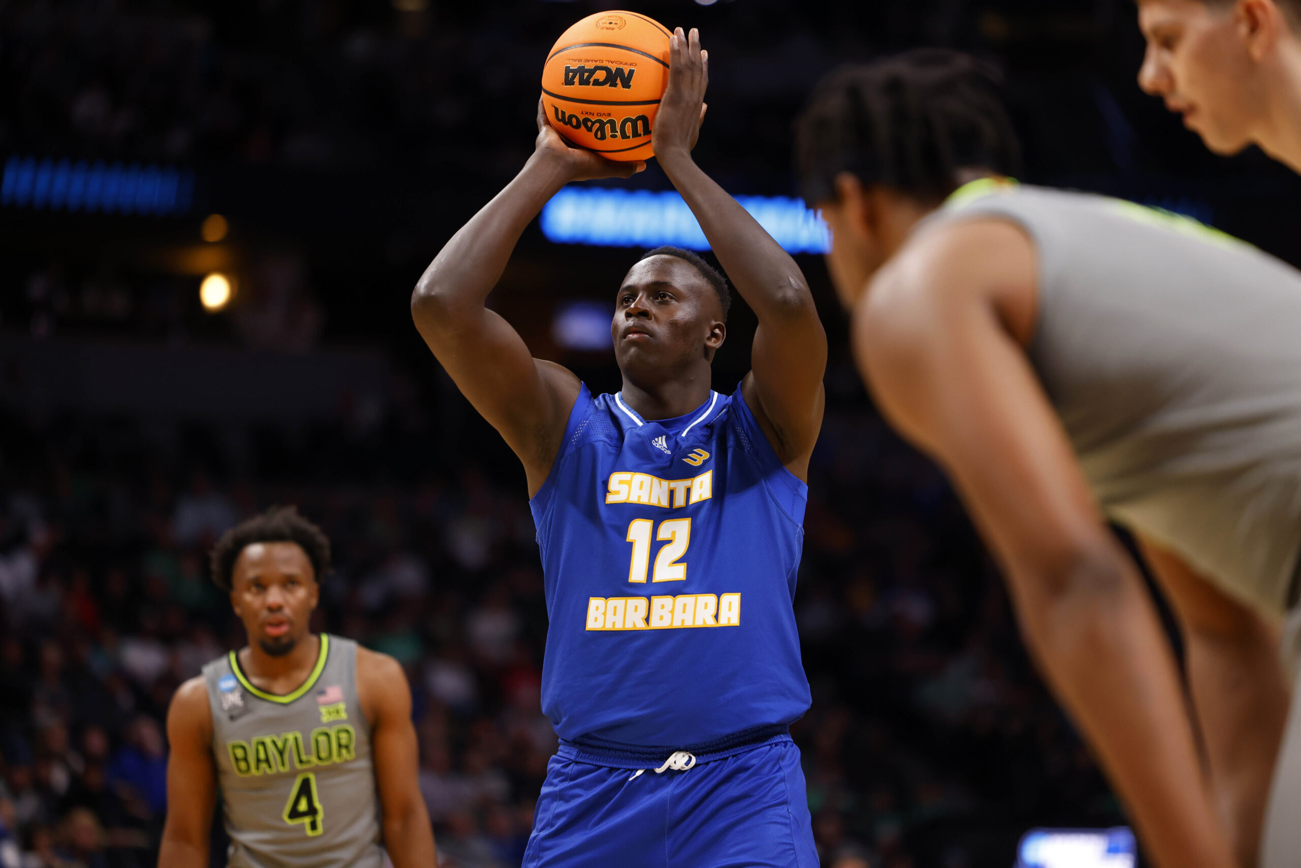 Mar 17, 2023; Denver, CO, USA;  UC Santa Barbara Gauchos forward Evans Kipruto (12) takes a shot at the basket during the first half against Baylor Bears in the first round of the 2023 NCAA men   s basketball tournament at Ball Arena. Mandatory Credit: Michael Ciaglo-Imagn Images